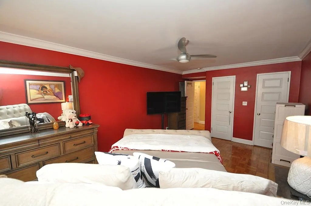 The large bedroom has two closet, parquet floors and can accommodate a king size bed, night stands, dresser and reading chair. The bedroom is approx. 20'-1" x 10'-6". The large bedroom has two closet, parquet floors and can accommodate a king size bed, night stands, dresser and reading chair. The bedroom is approx. 20'-1" x 10'-6".