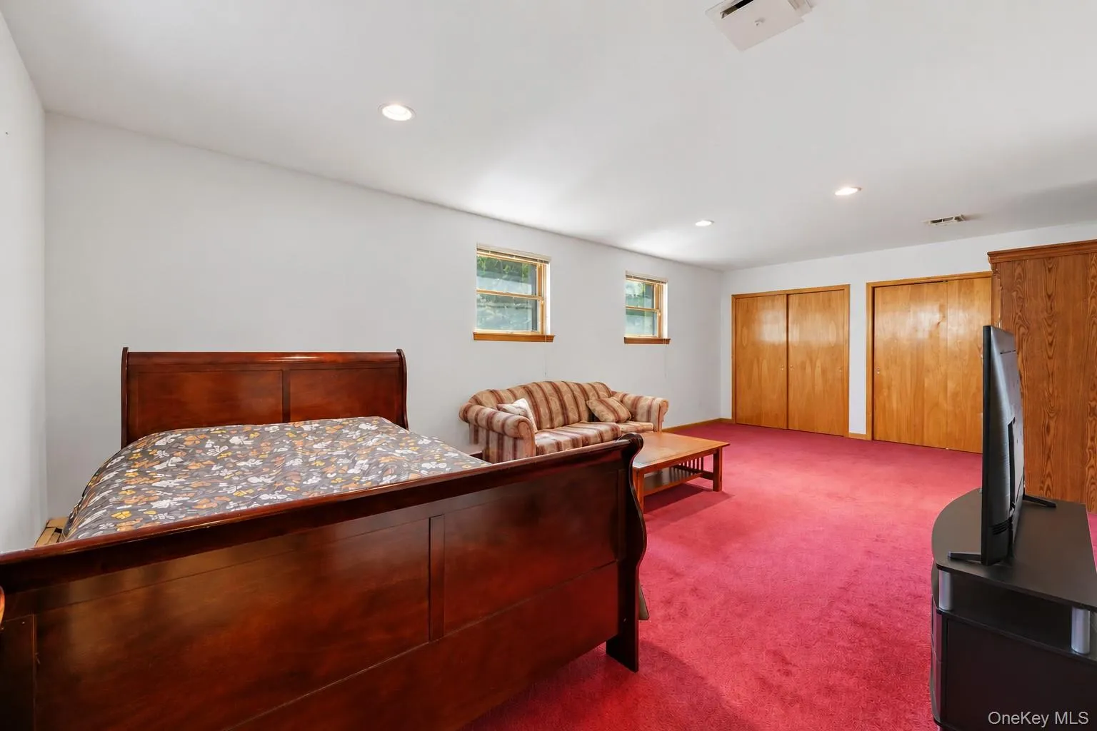 Basement rec room with natural light and plenty of windows Basement rec room with natural light and plenty of windows