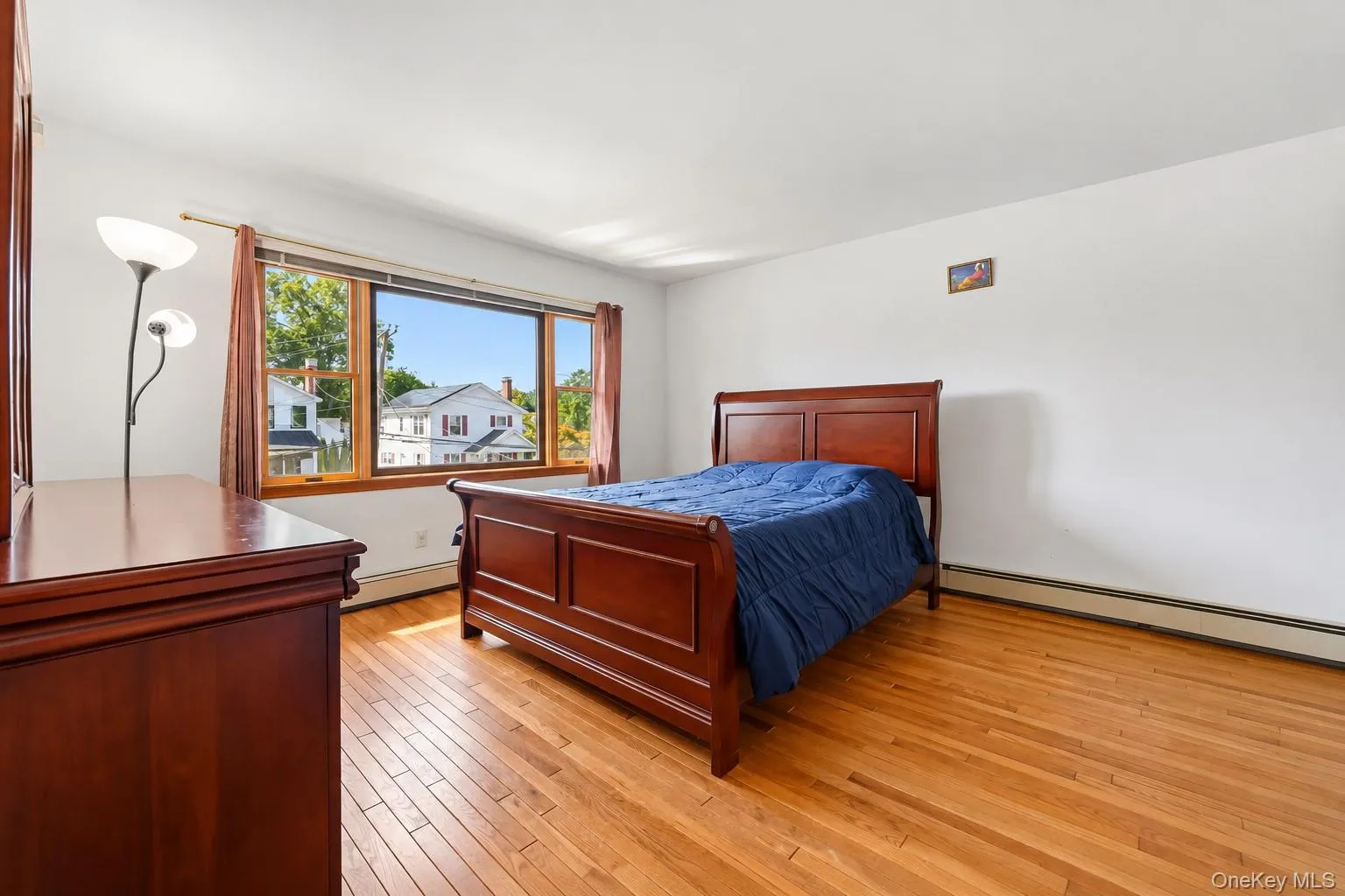 Primary bathroom- Second floor -Hardwood flooring with a wide window Primary bathroom- Second floor -Hardwood flooring with a wide window