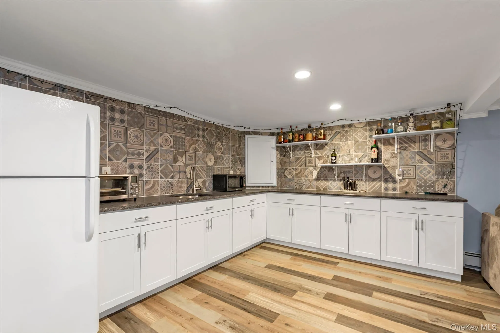 Wet Bar Area with Cabinets for Storage & Frige. Wet Bar Area with Cabinets for Storage & Frige.