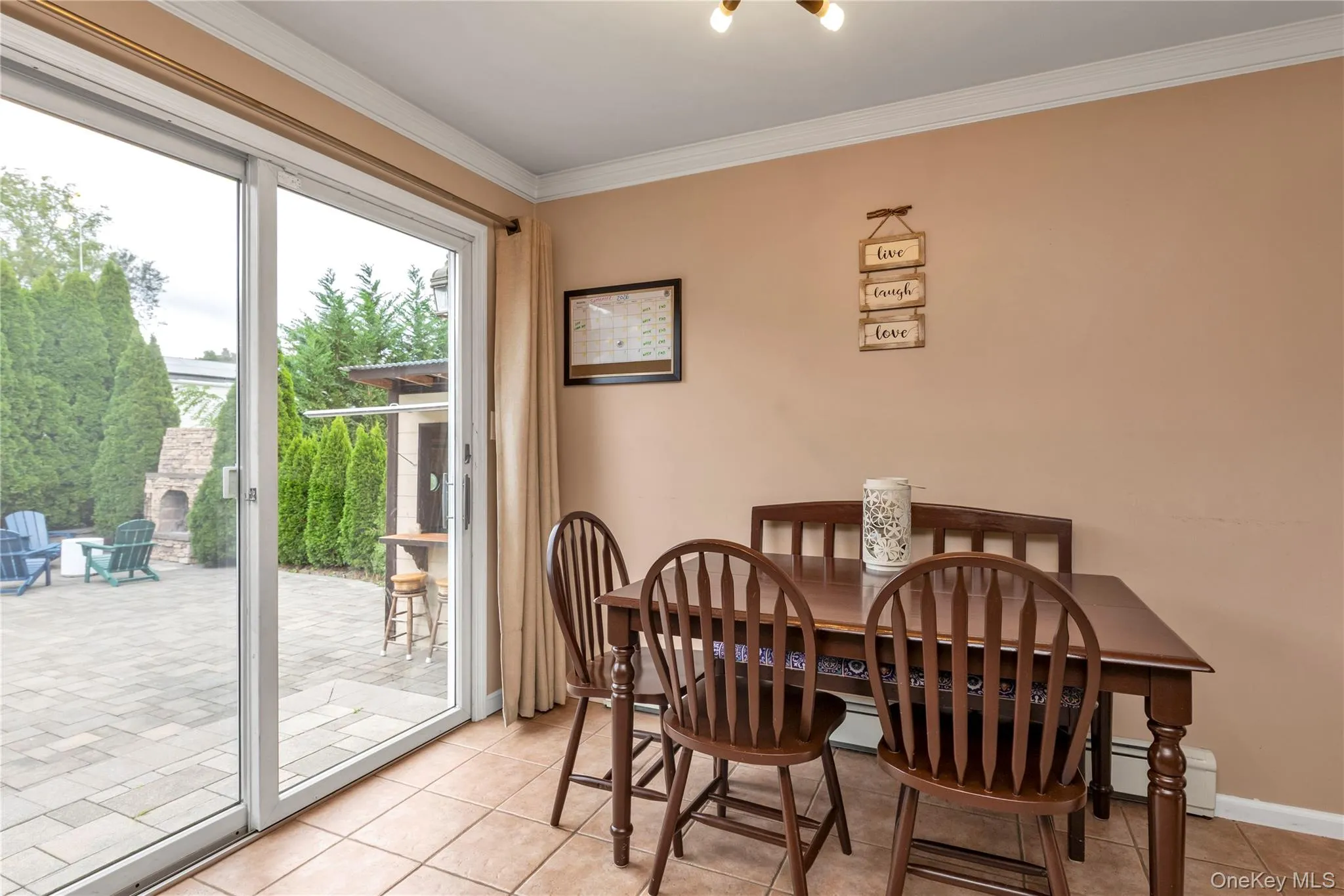 Dining Area That Has Sliders to The Yard. Dining Area That Has Sliders to The Yard.