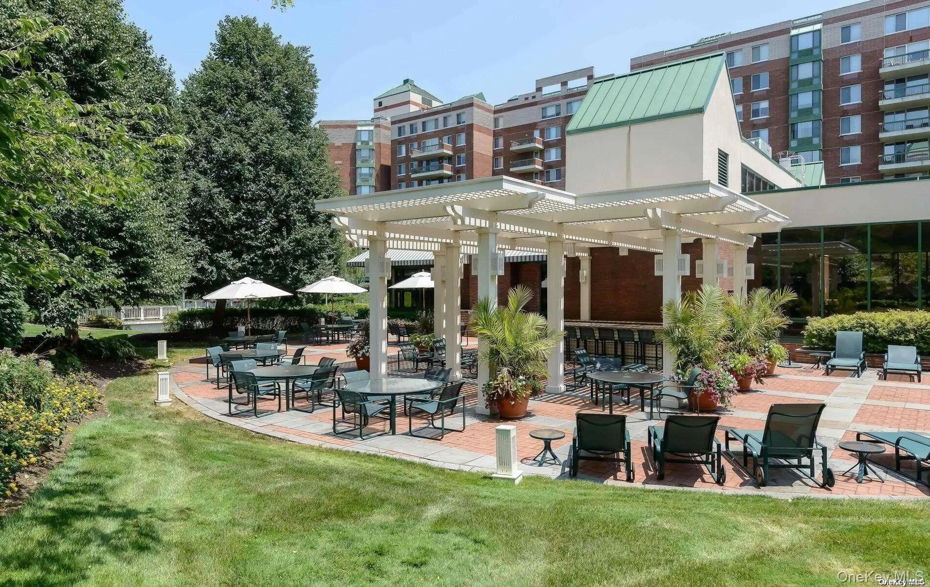 Common patio with bar area and bbqs Common patio with bar area and bbqs