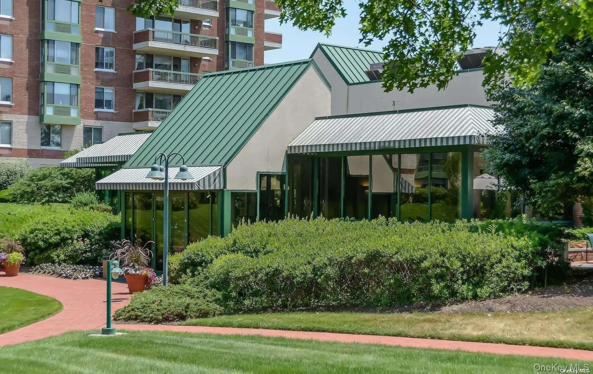 Community building which houses pool/spa/gym/sauna/locker rooms and party room Community building which houses pool/spa/gym/sauna/locker rooms and party room