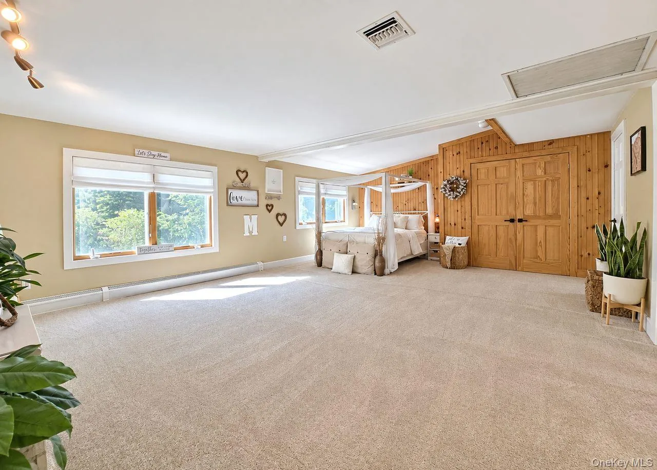 Expansive 2nd story primary bedroom, a private retreat Expansive 2nd story primary bedroom, a private retreat