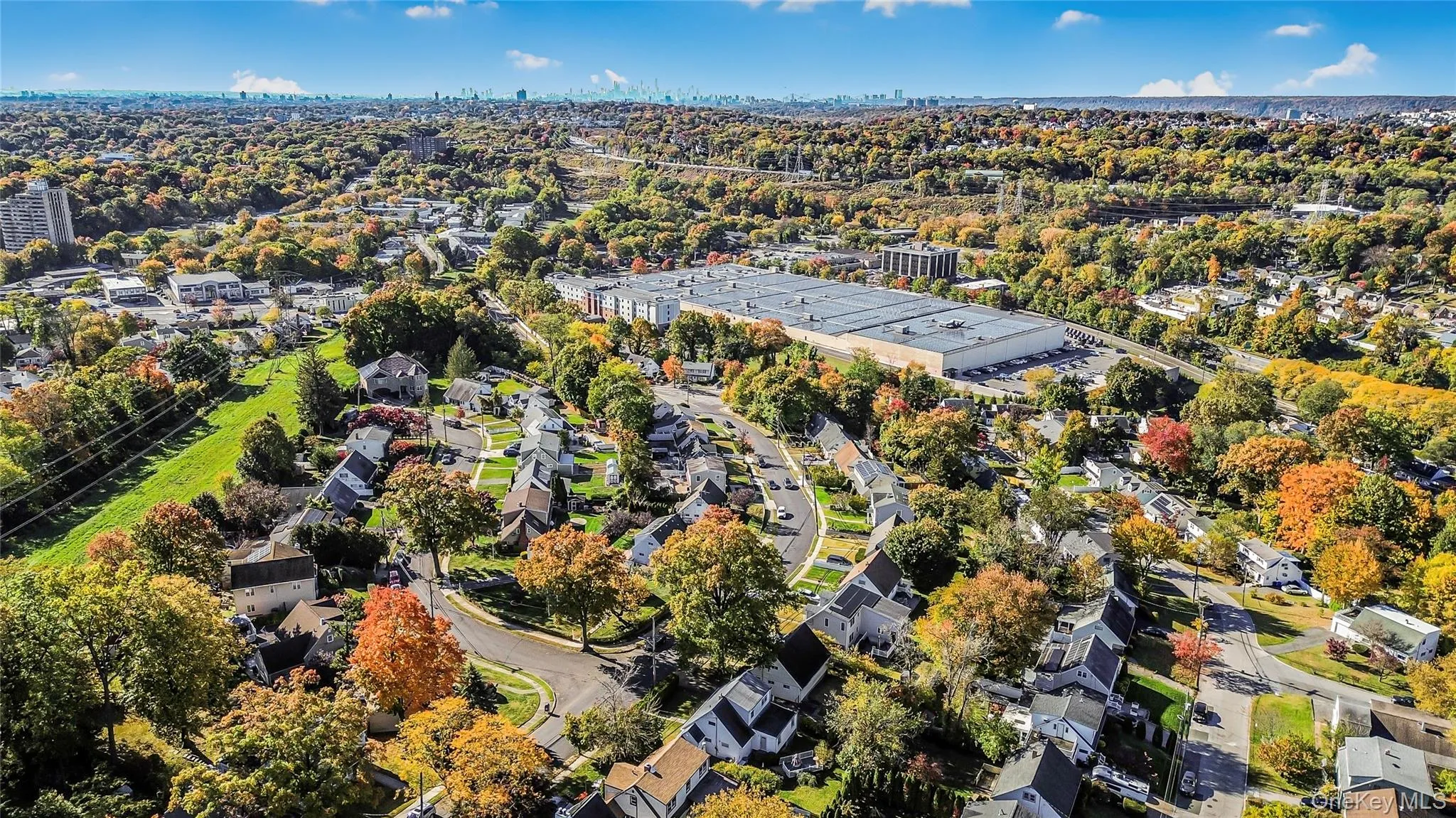 Aerial view of property's location with nearby suburban area Aerial view of property's location with nearby suburban area