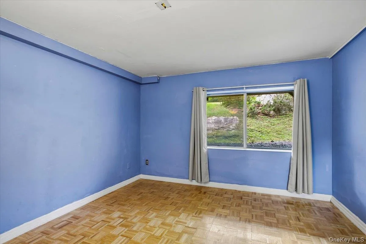 Actual photo of the basement which has access to the attached garage and laundry. Actual photo of the basement which has access to the attached garage and laundry.
