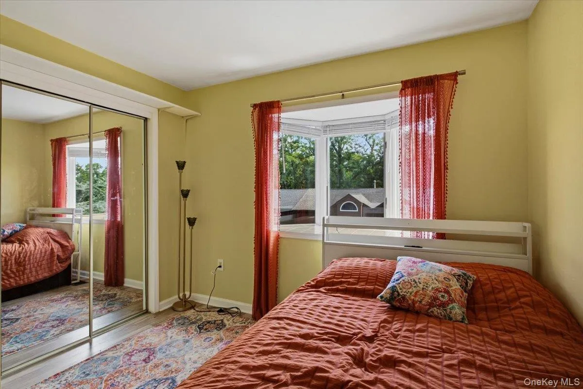 View of the second floor bonus room currently being used as a bedroom. On the property card as an office. View of the second floor bonus room currently being used as a bedroom. On the property card as an office.
