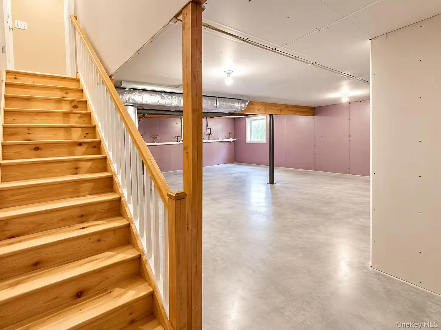 Natural wood staircase with white balusters Natural wood staircase with white balusters