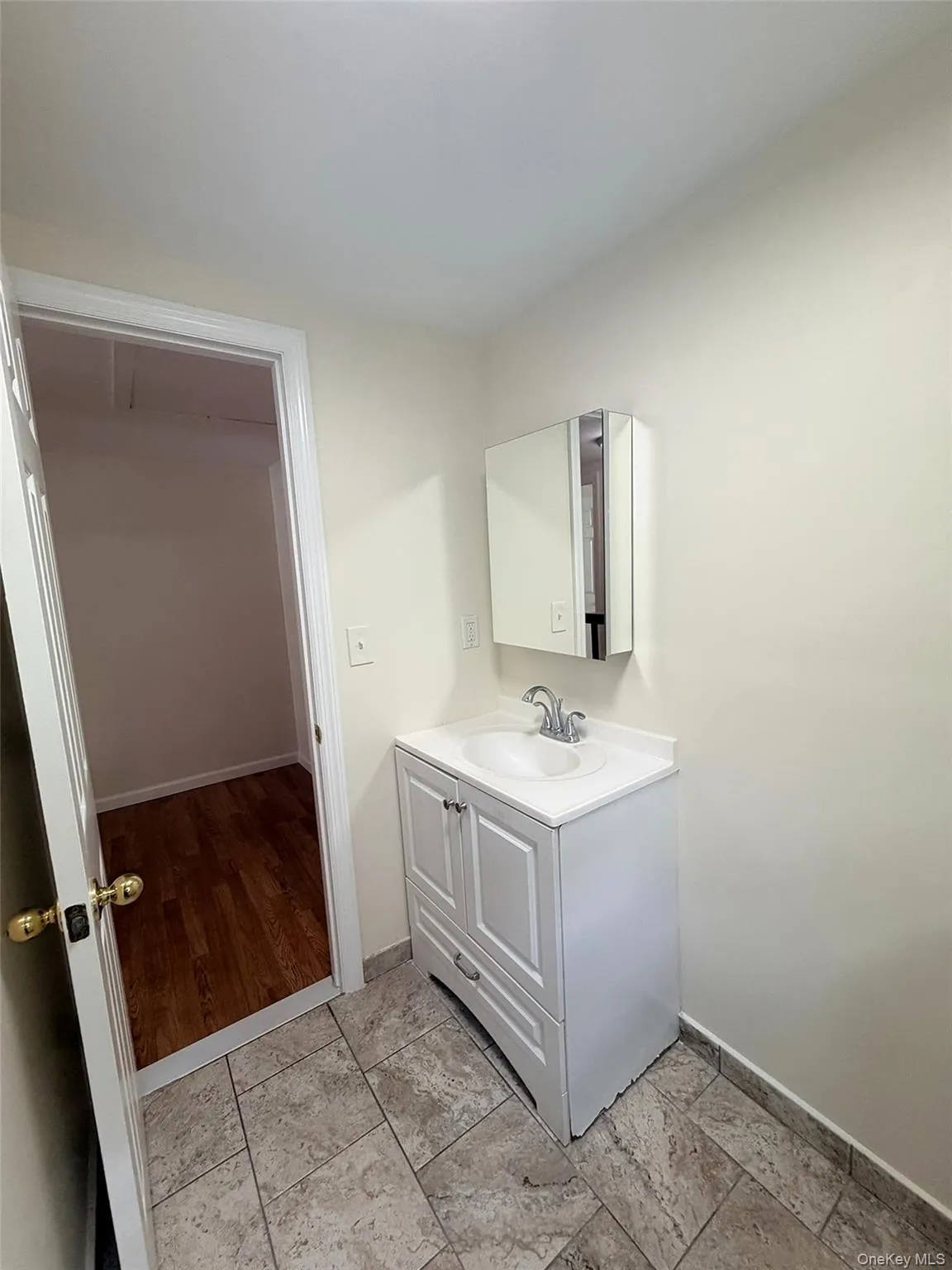 The vanity and toilet were also updated. The vanity and toilet were also updated.