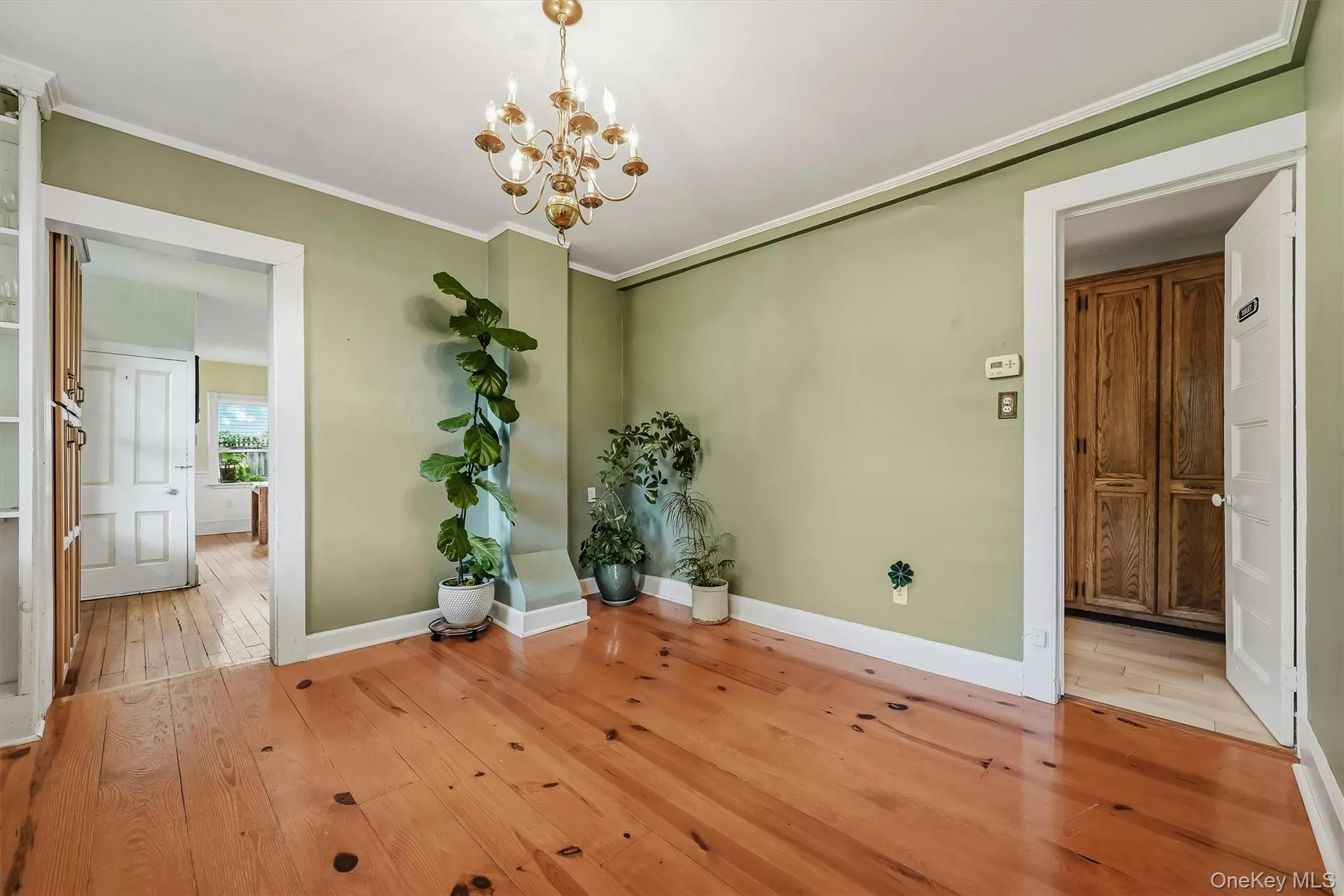 Formal dining room with hardwood floors and easy access to the kitchen Formal dining room with hardwood floors and easy access to the kitchen