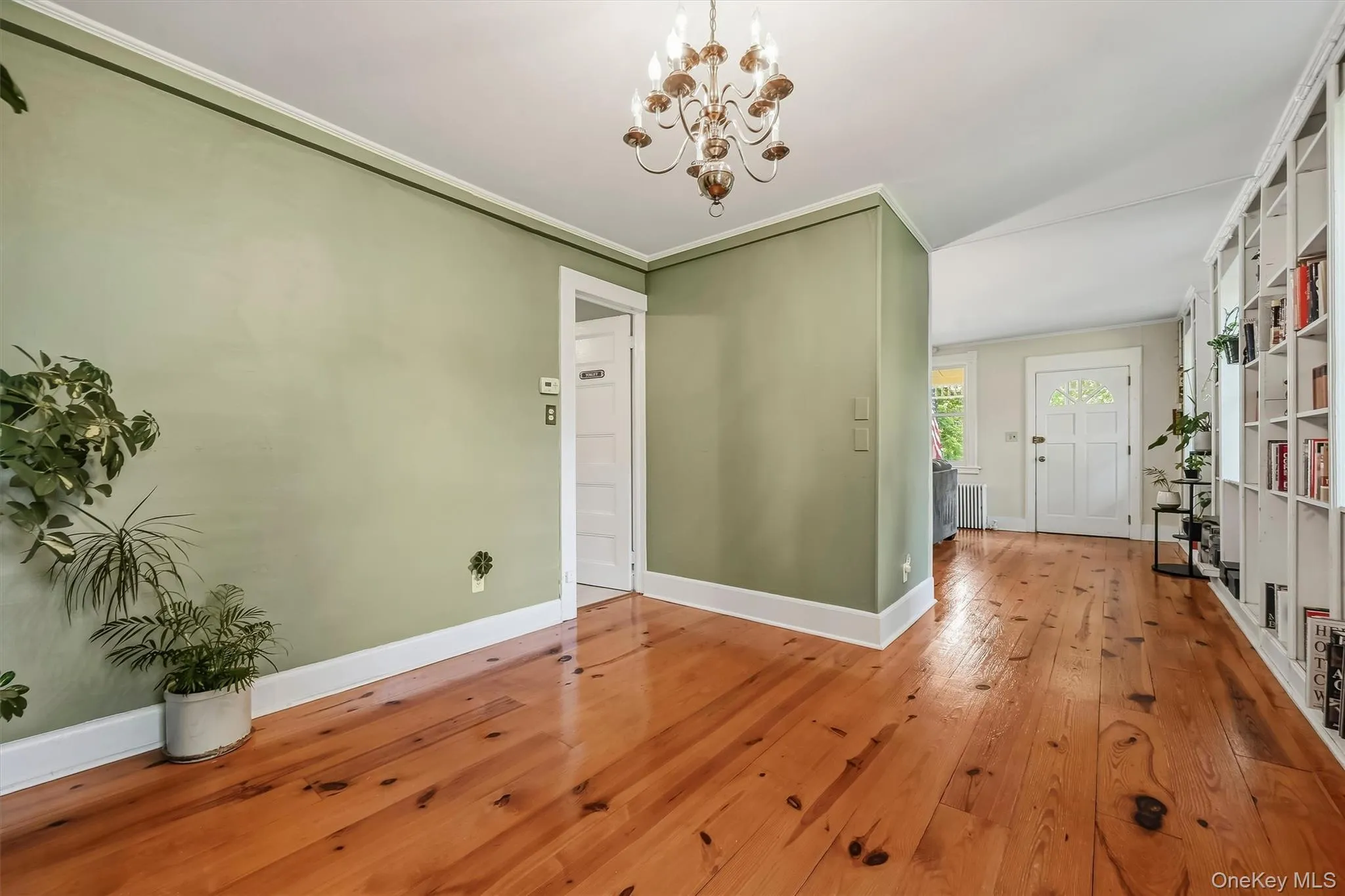 Wood floors and an open flow between the dining and living spaces Wood floors and an open flow between the dining and living spaces