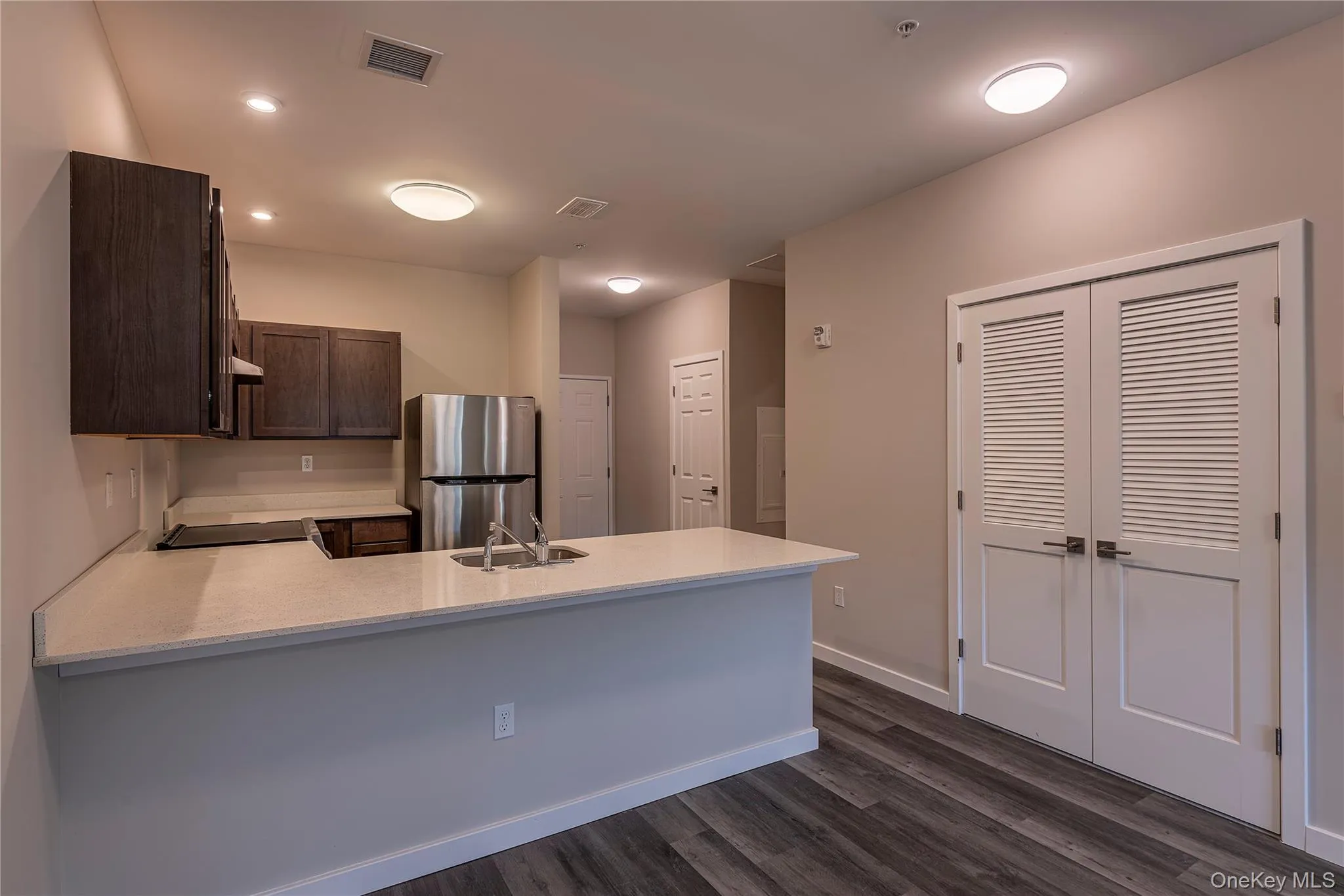 Representative kitchen showing finishes and fixtures at Zero Place. Representative kitchen showing finishes and fixtures at Zero Place.