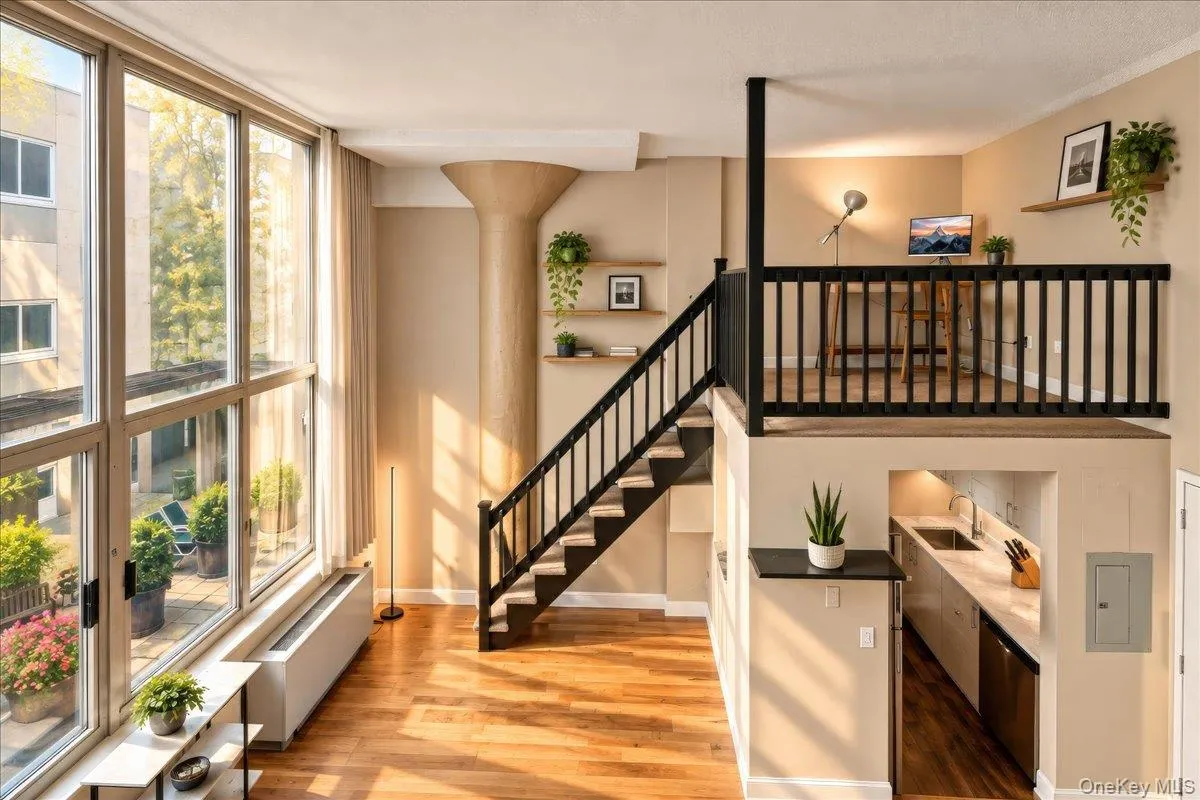 Virtually staged -Expansive views of garden courtyard from both floors Virtually staged -Expansive views of garden courtyard from both floors