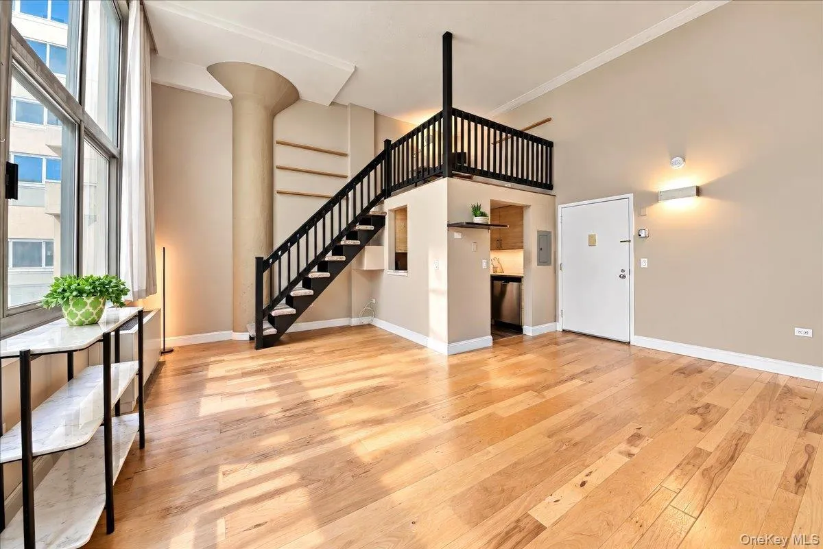 Living-Dining area with kitchen and bonus room/loft Living-Dining area with kitchen and bonus room/loft