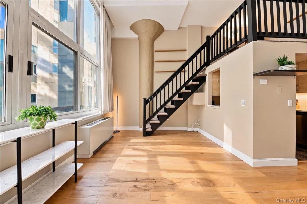 Expansive views of garden courtyard from both floors Expansive views of garden courtyard from both floors