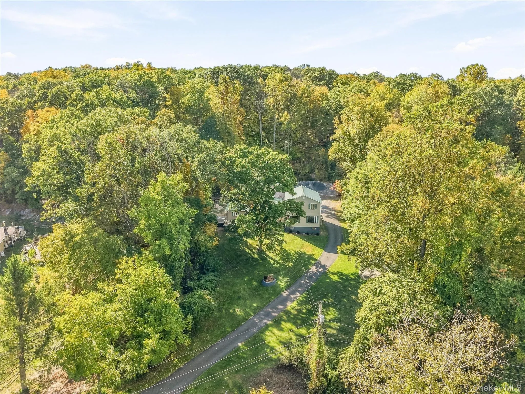Aerial View of 124 Lily Lake Rd from Road. Aerial View of 124 Lily Lake Rd from Road.