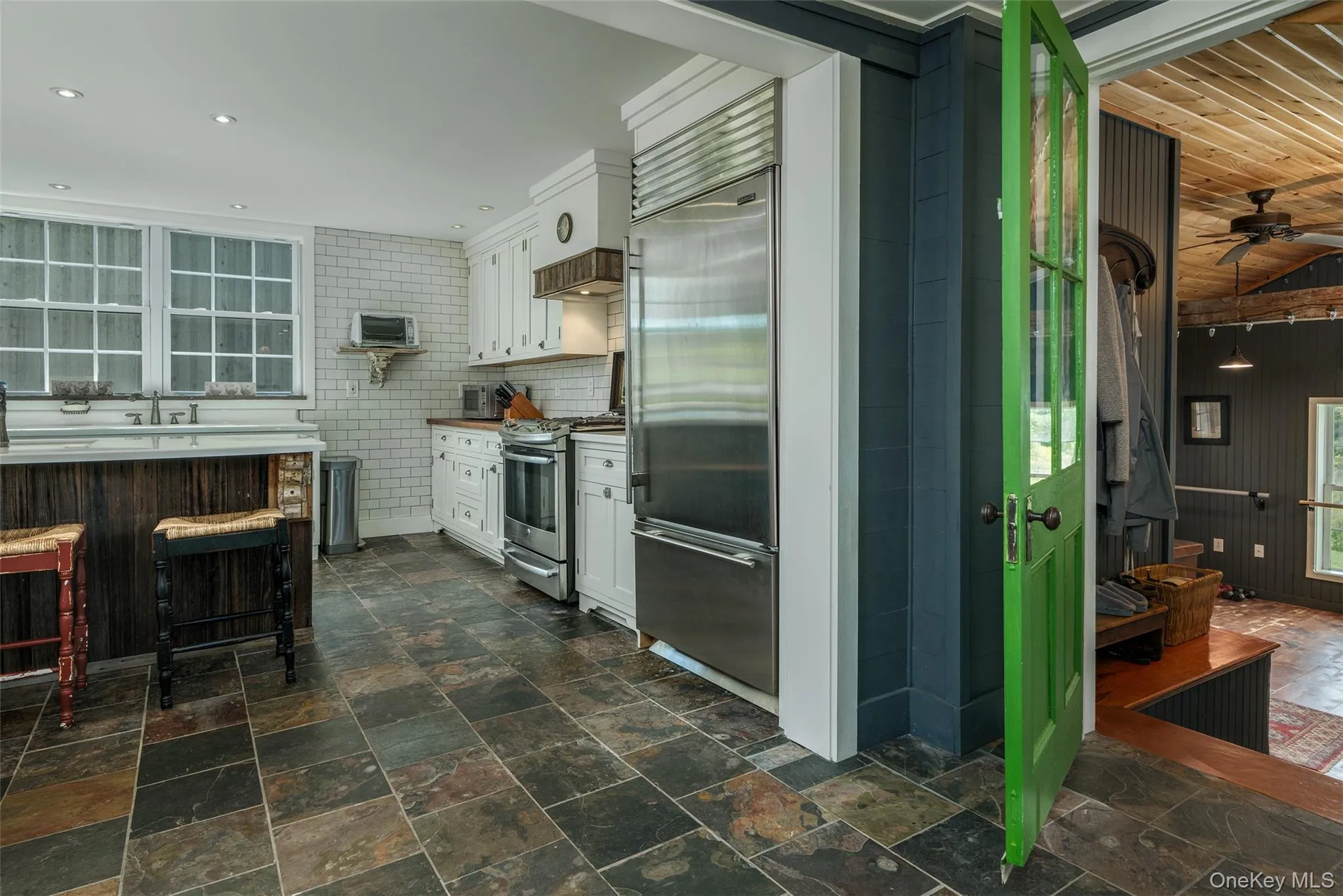 Kitchen leading into the mudroom Kitchen leading into the mudroom