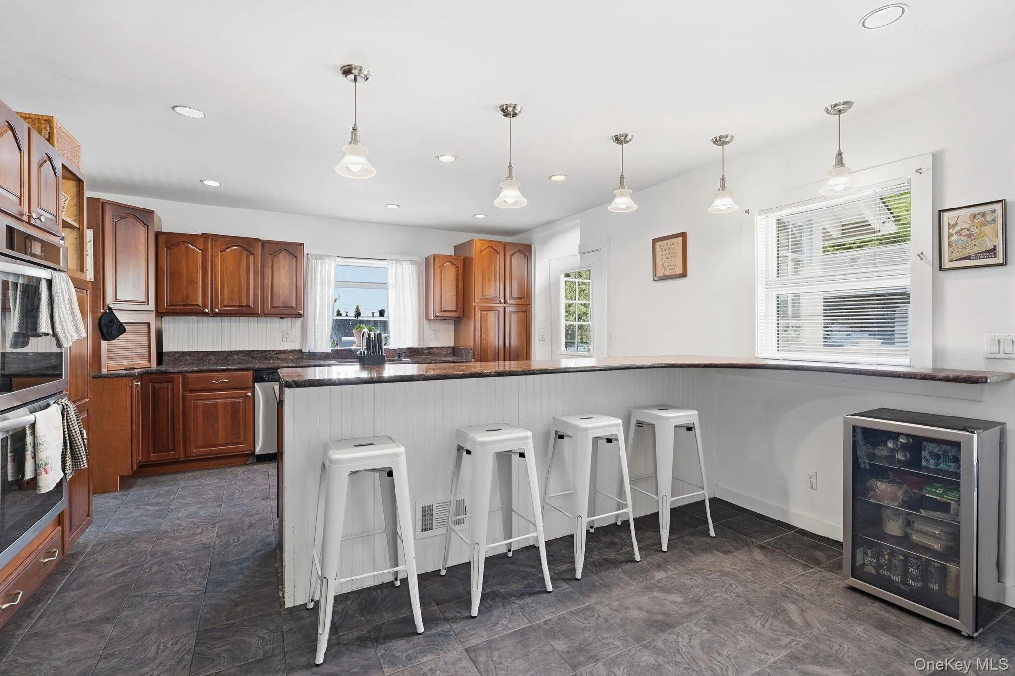 Casual seating with a view into the kitchen Casual seating with a view into the kitchen