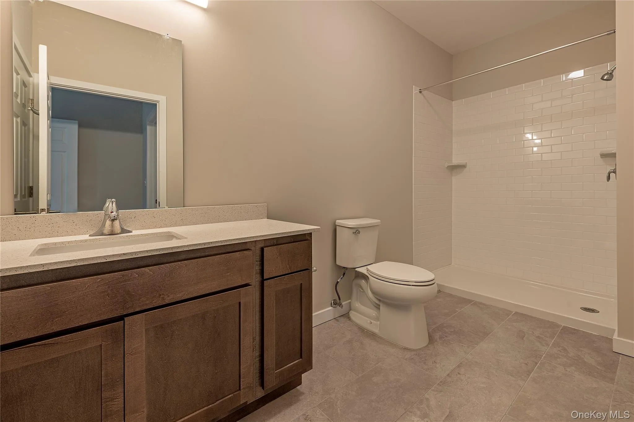 Representative bathroom showing finishes and fixtures at Zero Place. Representative bathroom showing finishes and fixtures at Zero Place.