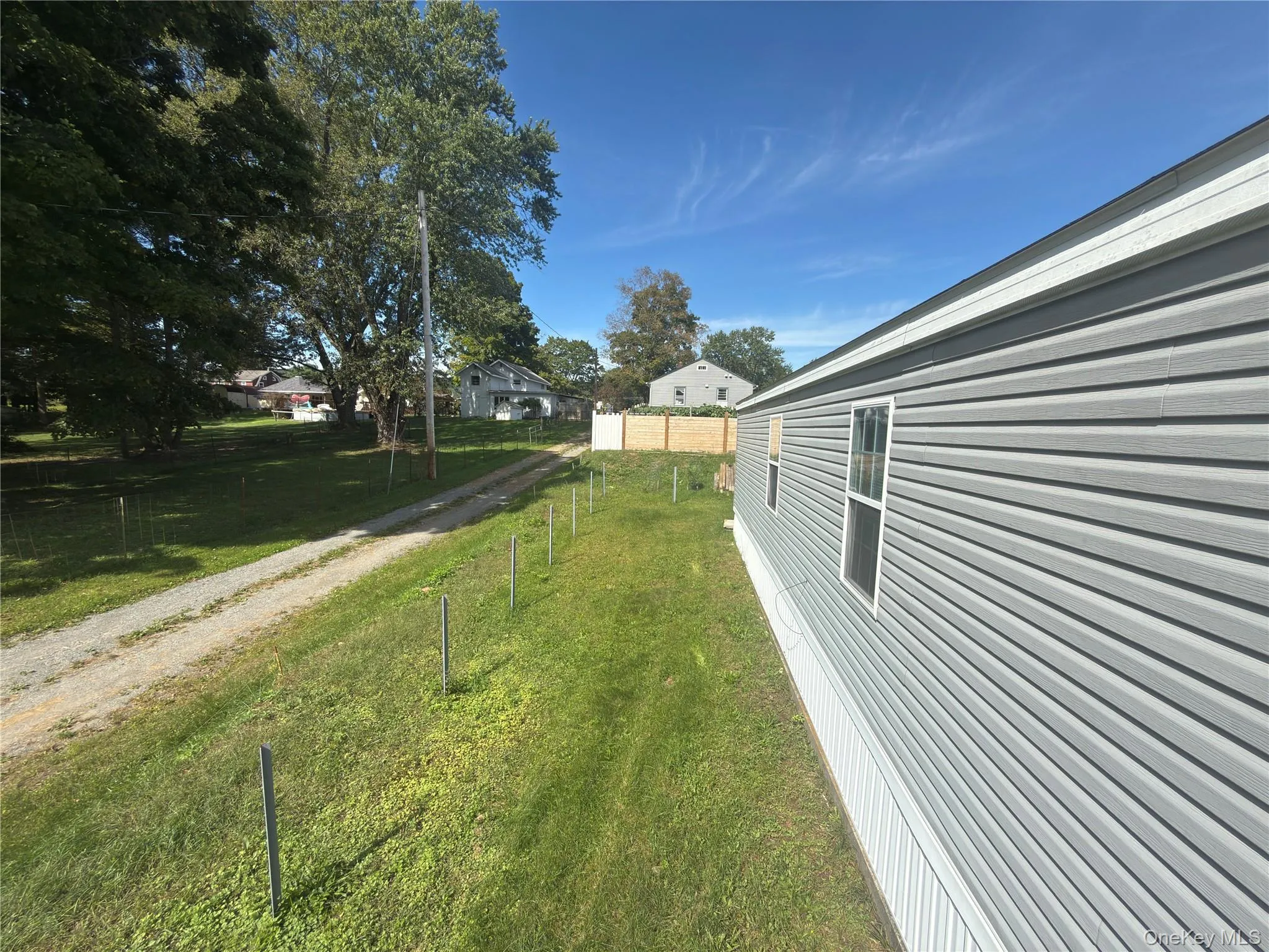 Gray horizontal vinyl siding with white trim Gray horizontal vinyl siding with white trim