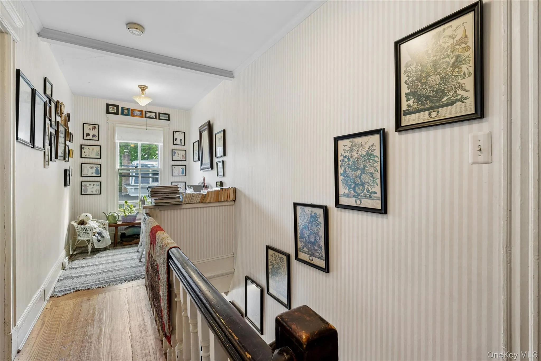 Upstairs, a sweet sunlit nook creates a natural spot for a desk, homework station, reading area, or quiet home office. Upstairs, a sweet sunlit nook creates a natural spot for a desk, homework station, reading area, or quiet home office.