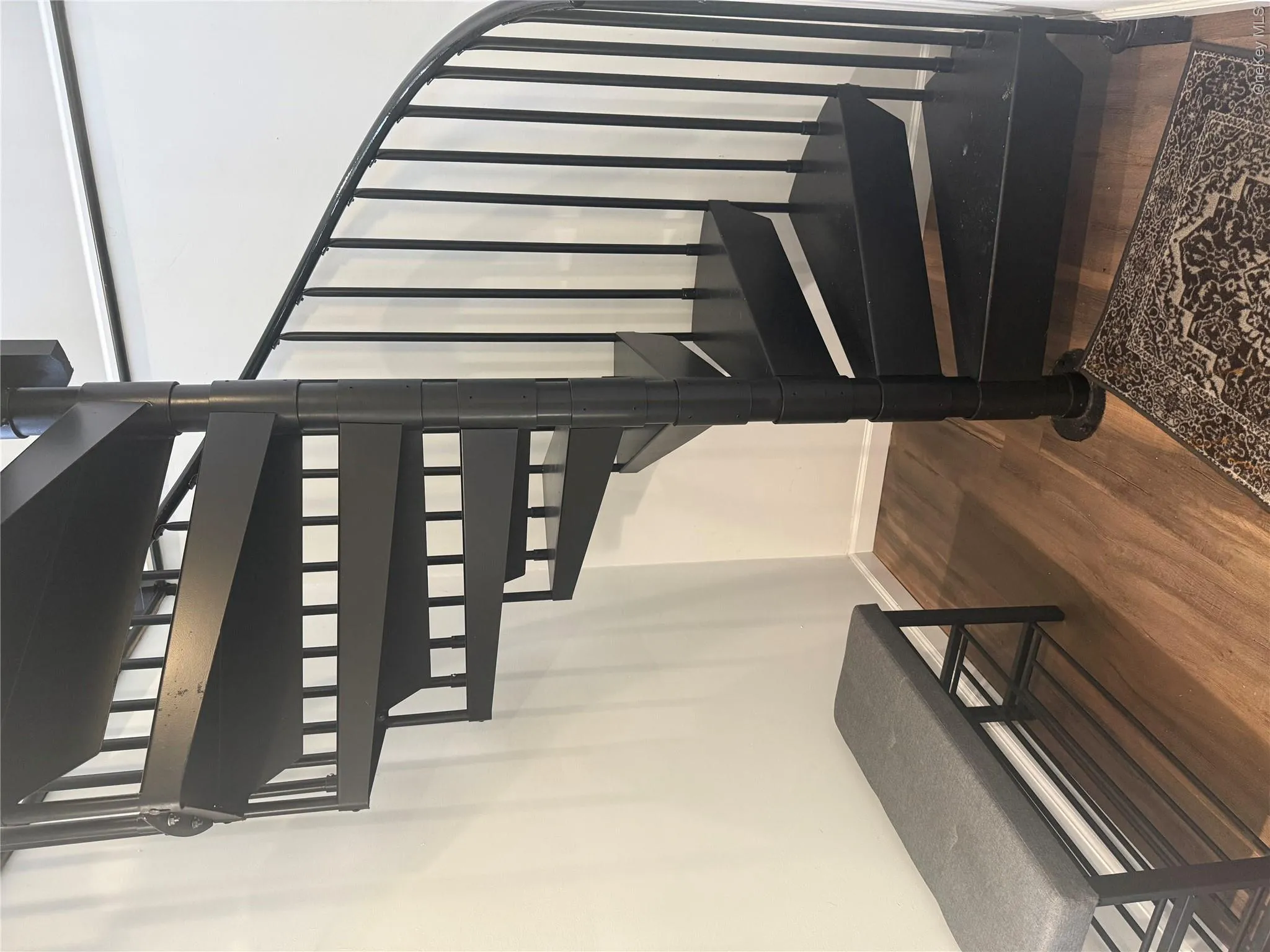 Spiral stairs going down to the basement Spiral stairs going down to the basement