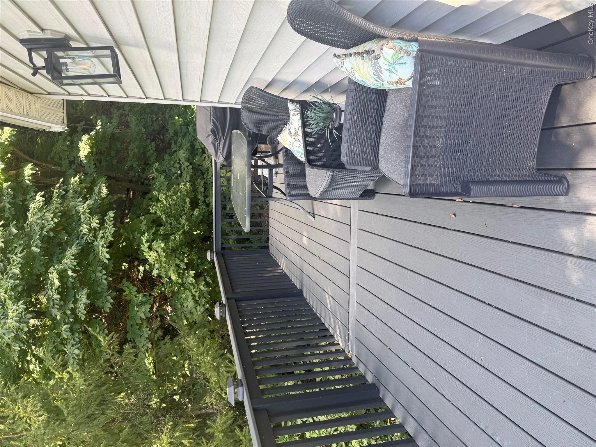 This deck gives front views to the lake and a place to sit outside This deck gives front views to the lake and a place to sit outside