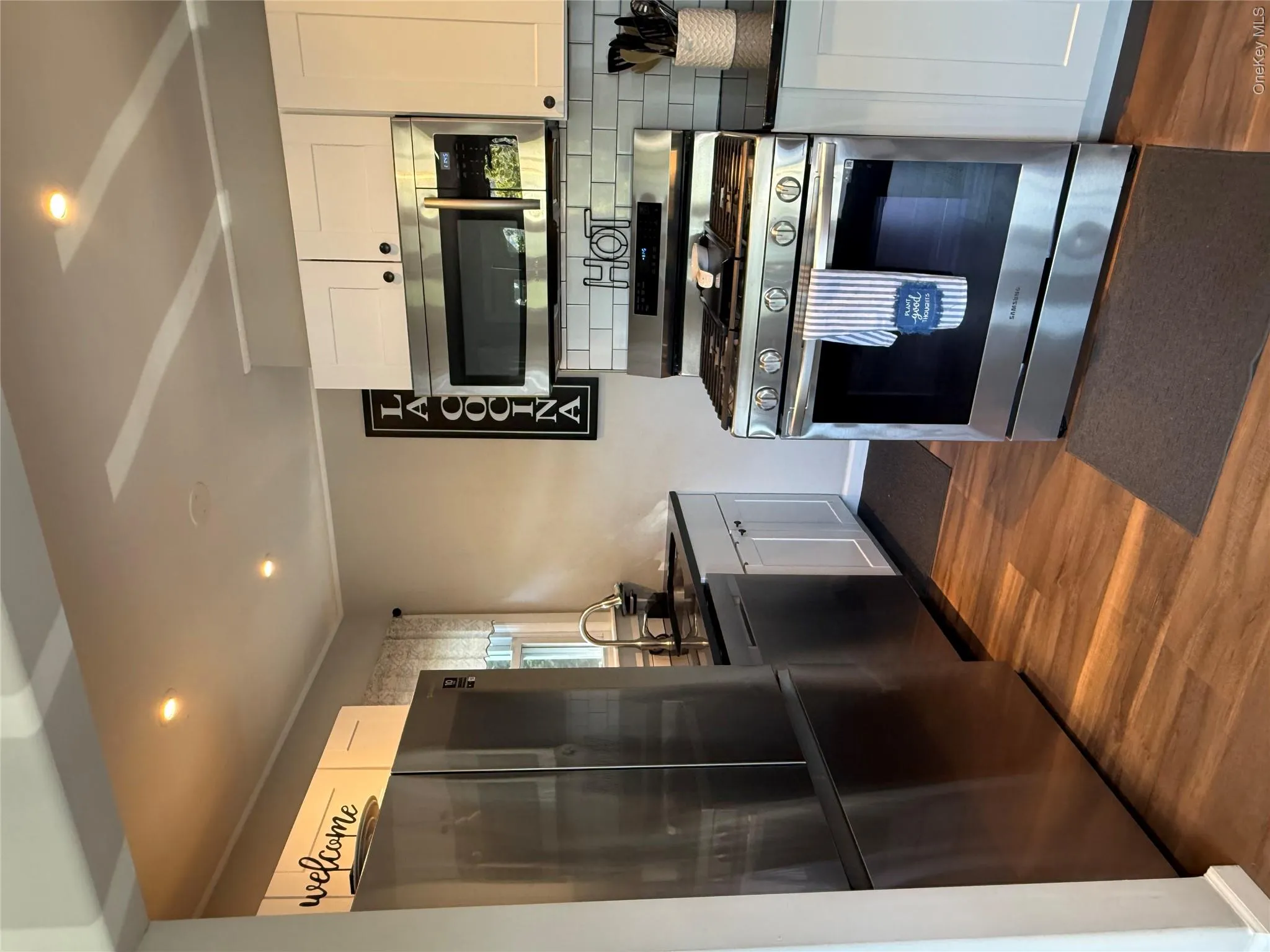 View of refrigerator on the left side with the sink and more space View of refrigerator on the left side with the sink and more space
