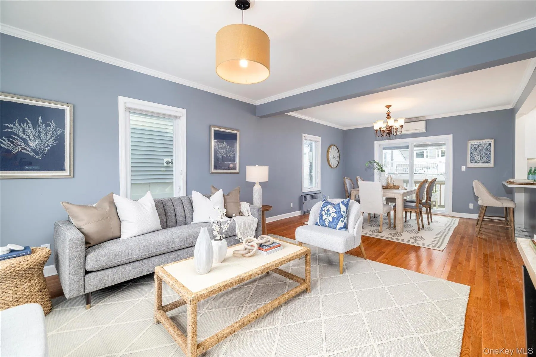 Open concept living area with hardwood floors throughout Open concept living area with hardwood floors throughout