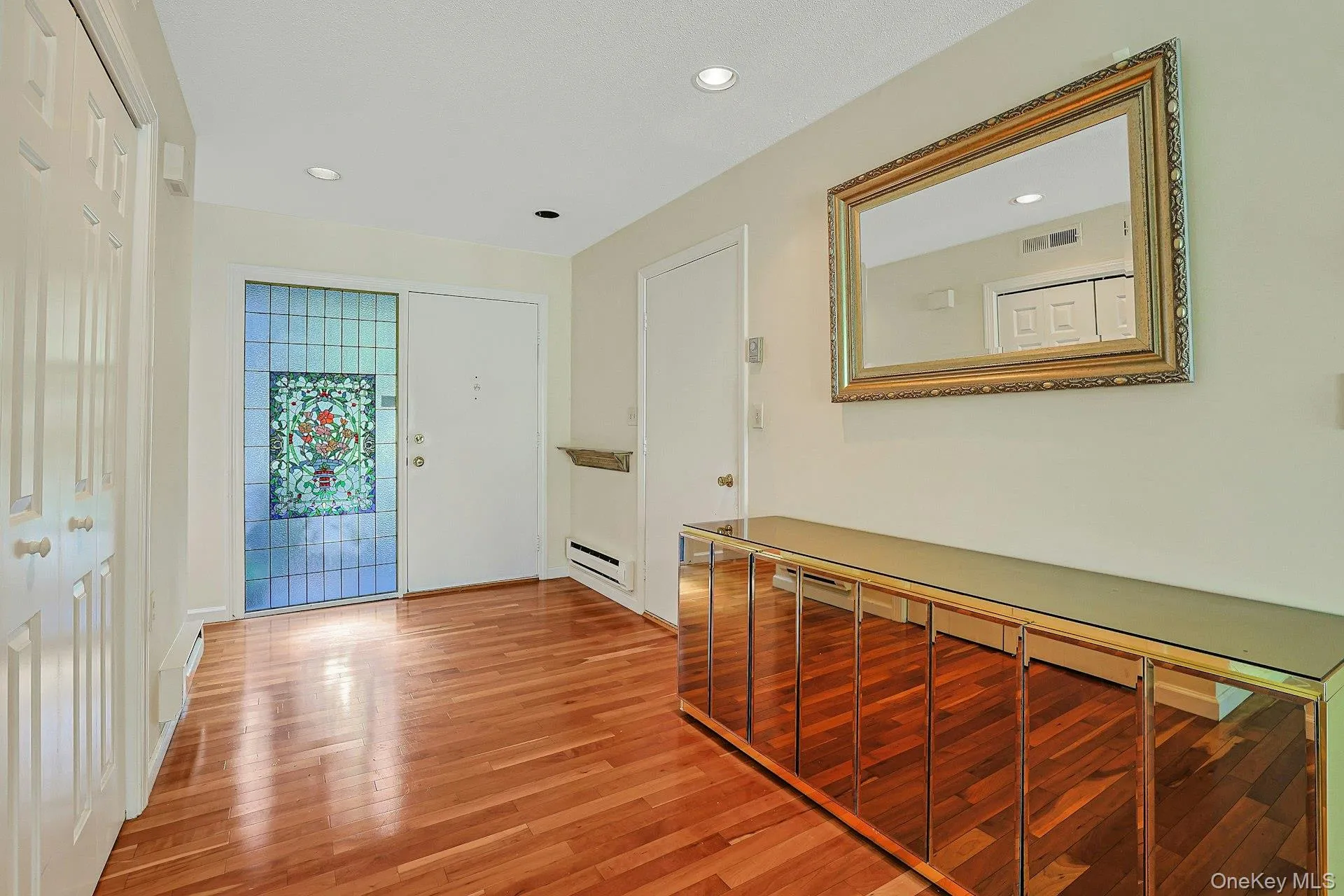 Front door and direct access to garage Front door and direct access to garage