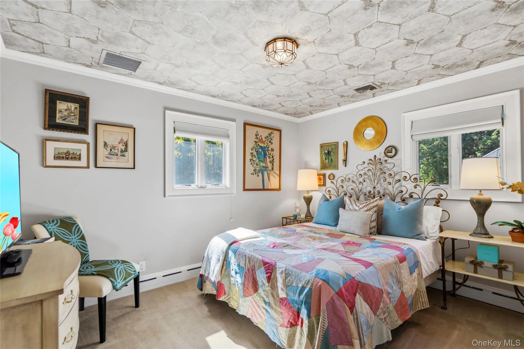 First Floor Bedroom with Distinctive hexagonal patterned ceiling treatment, dual windows with crisp white casing, and a central flush-mount geometric light fixture First Floor Bedroom with Distinctive hexagonal patterned ceiling treatment, dual windows with crisp white casing, and a central flush-mount geometric light fixture
