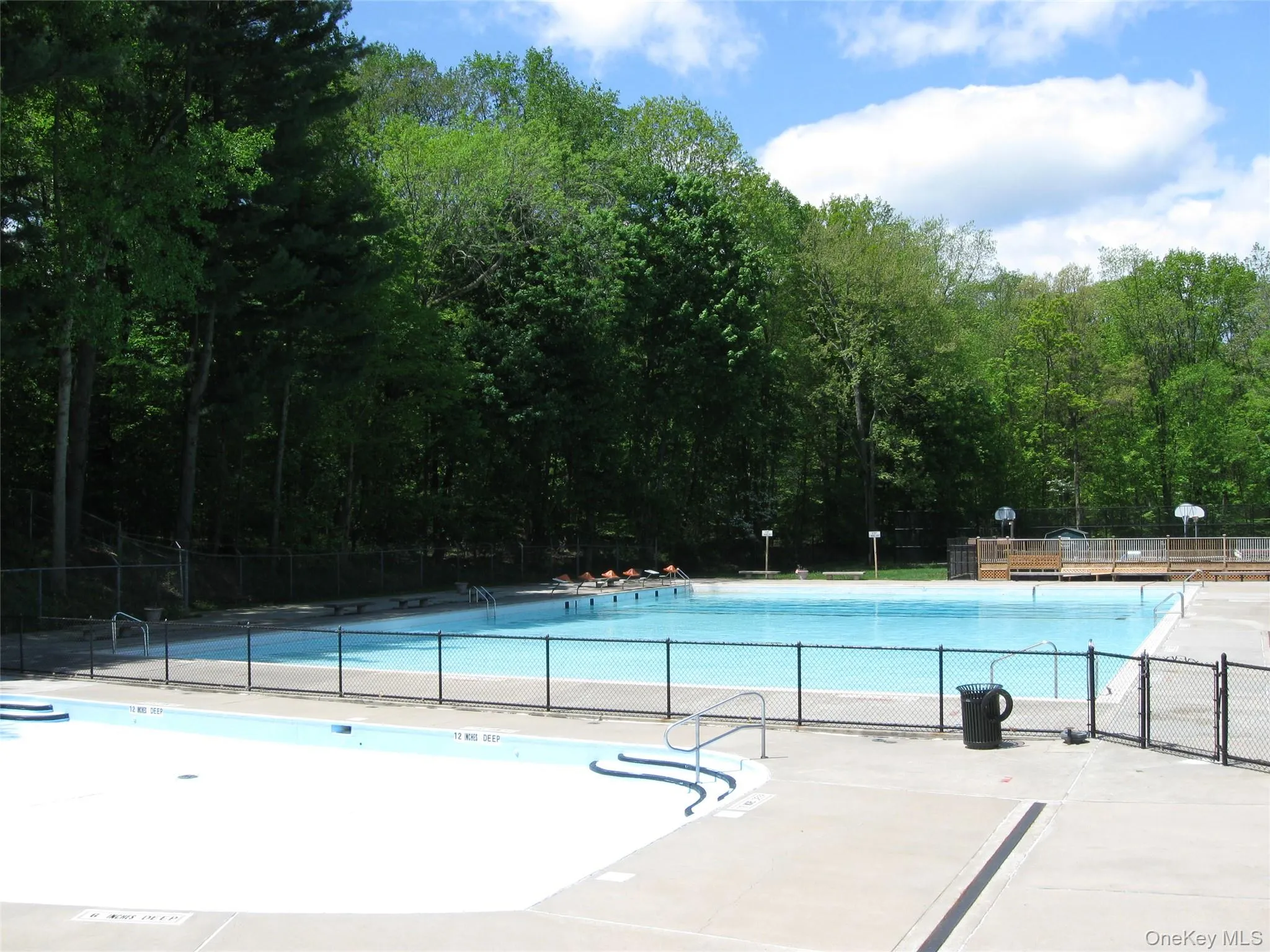 Pleasantville Pool .. Basket Ball Courts in the Background. Pleasantville Pool .. Basket Ball Courts in the Background.
