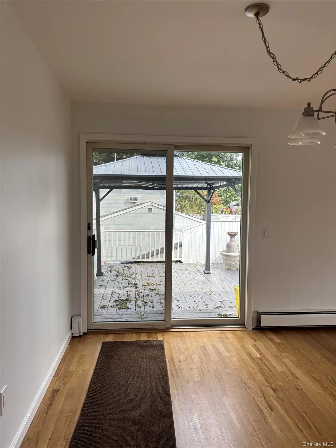 Dining room with entrance to balcony. Dining room with entrance to balcony.