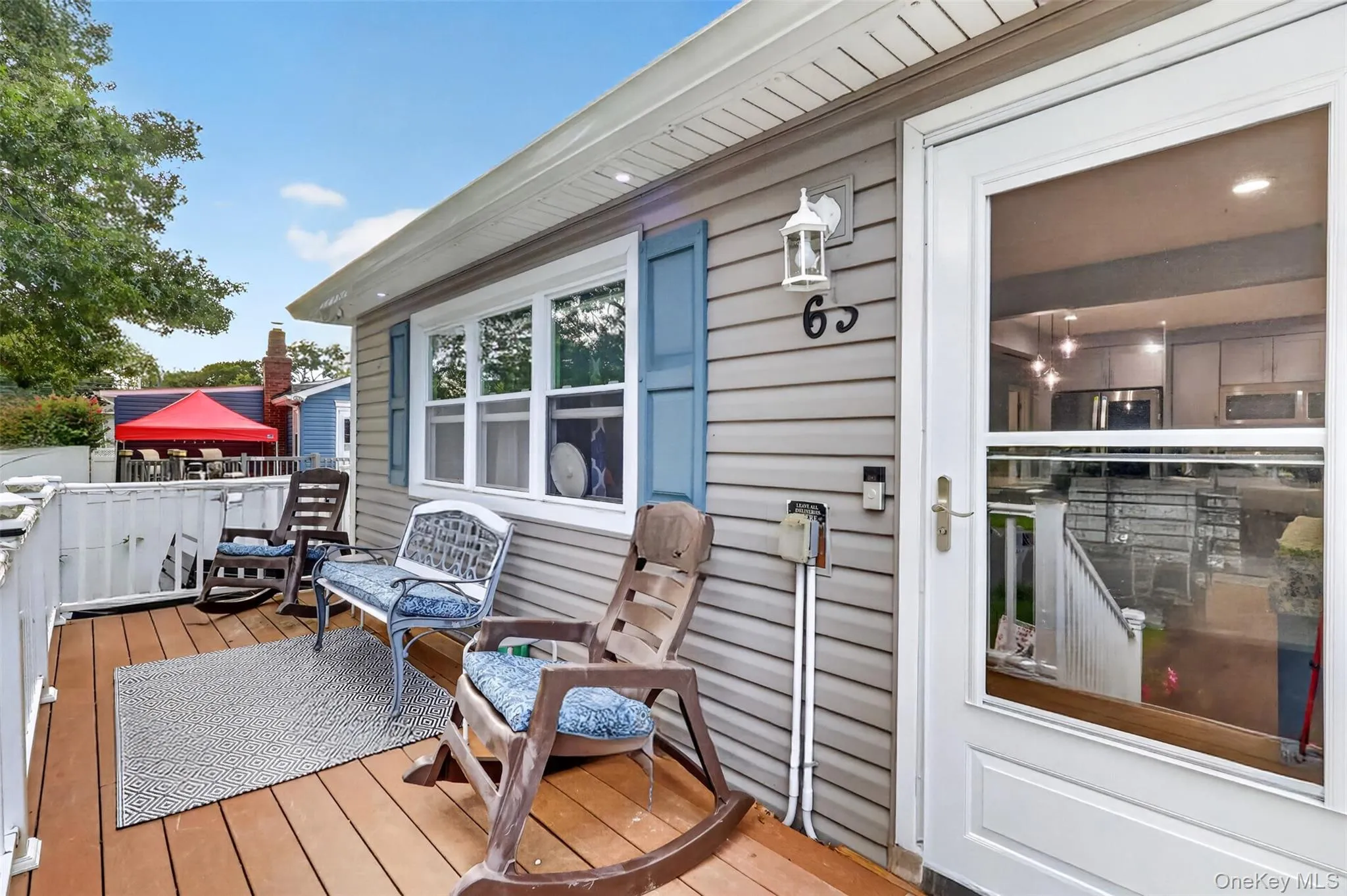 Welcoming Deck provides entry. Welcoming Deck provides entry.