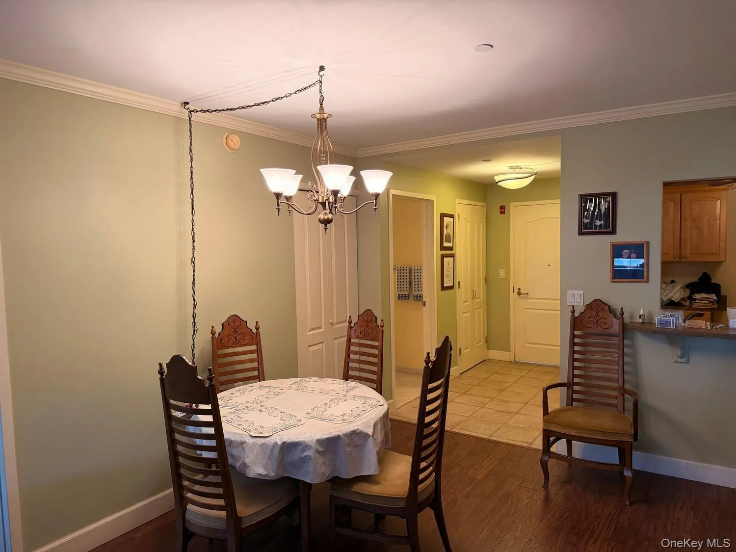 Dining Room just off the kitchen as shown. Plenty of room for a larger table and additional seating can be placed at the nook facing the window cutout into the kitchen. Dining Room just off the kitchen as shown. Plenty of room for a larger table and additional seating can be placed at the nook facing the window cutout into the kitchen.