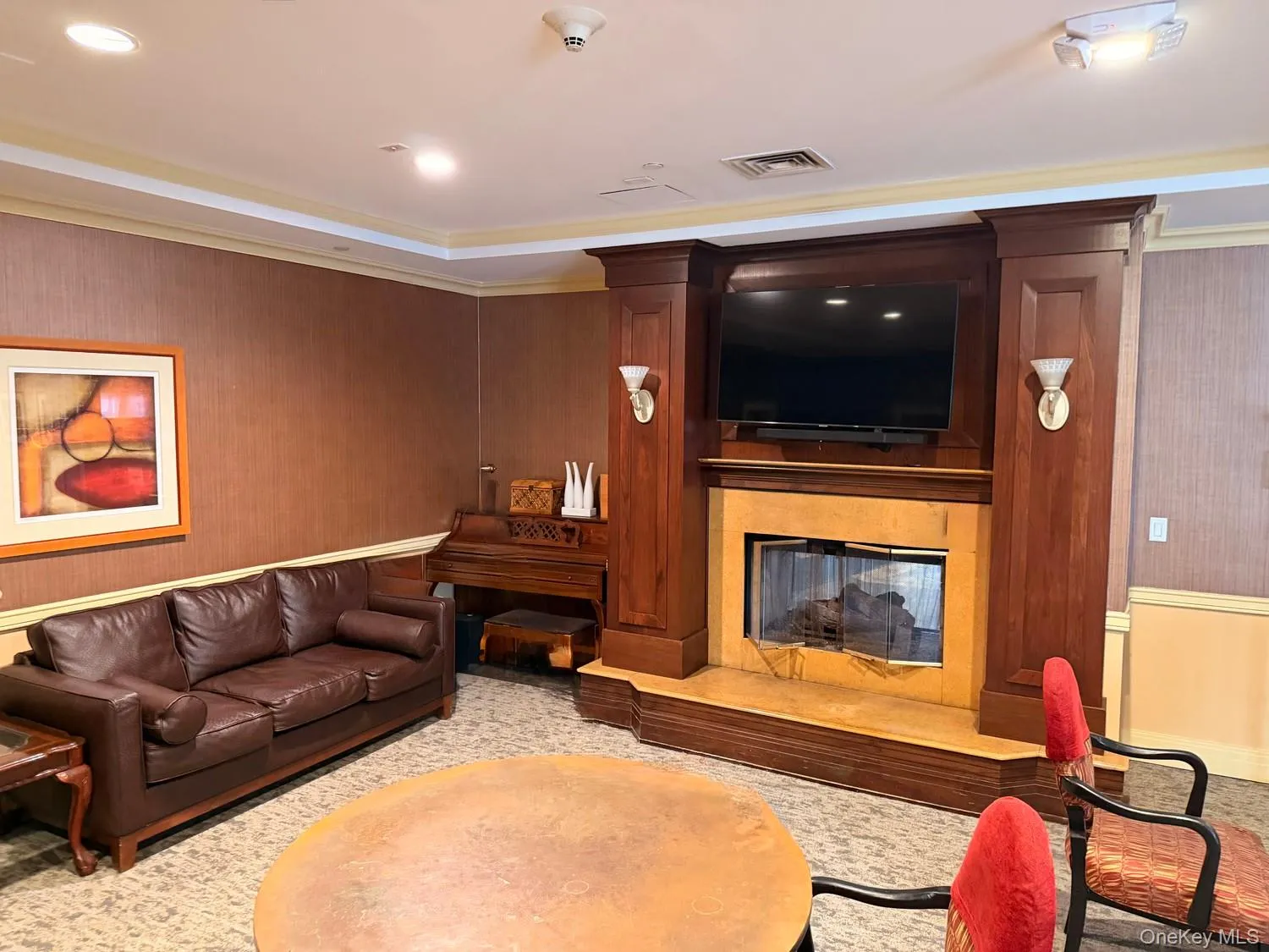 Over sized party room with fireplace, piano and lounge chairs available can be rented/reserved Over sized party room with fireplace, piano and lounge chairs available can be rented/reserved