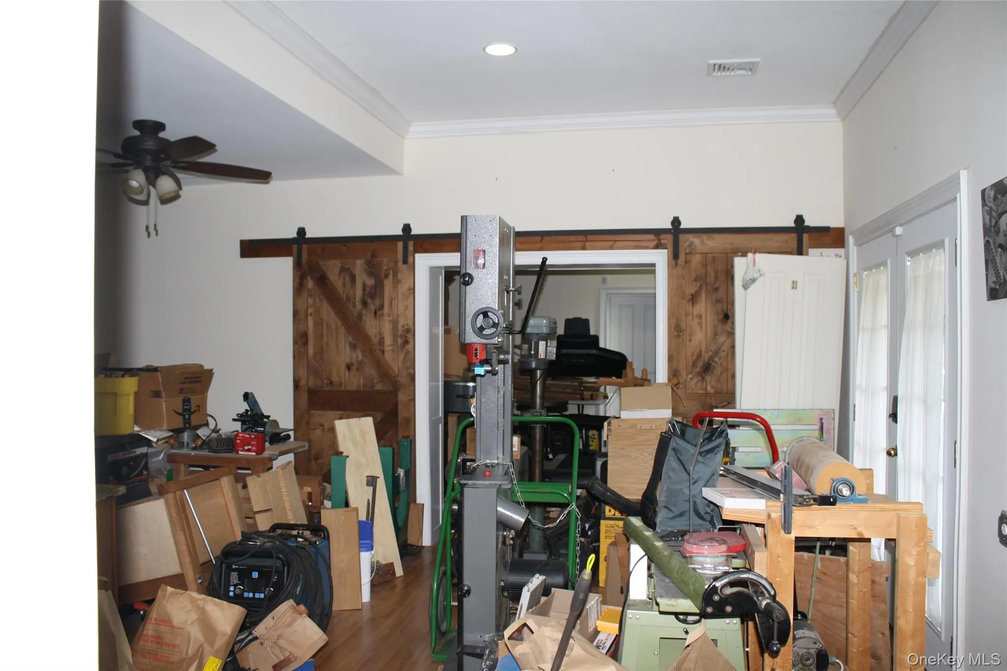 Lower Level space with barn doors to separate Lower Level space with barn doors to separate