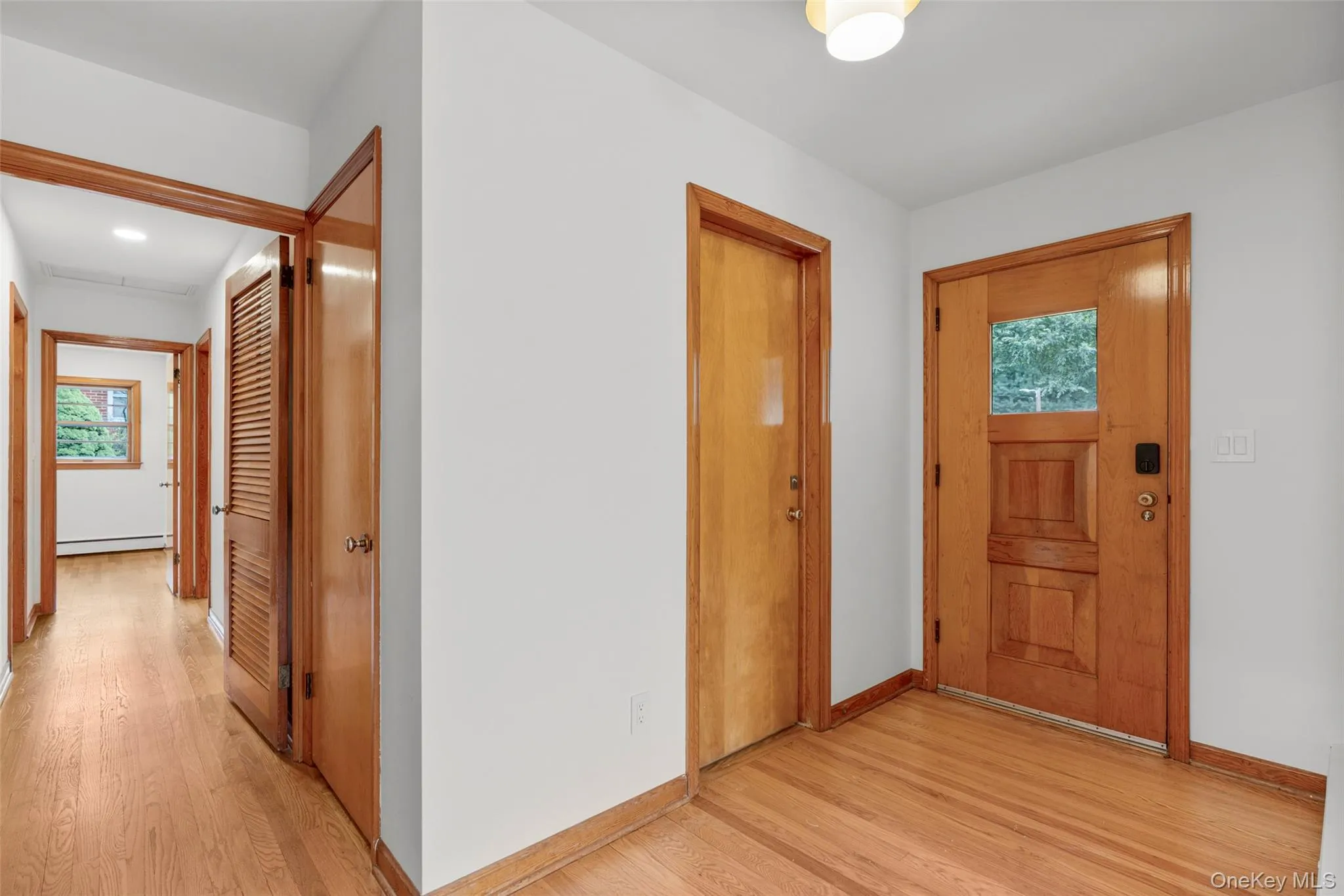 Entry foyer with pristine oak floors Entry foyer with pristine oak floors