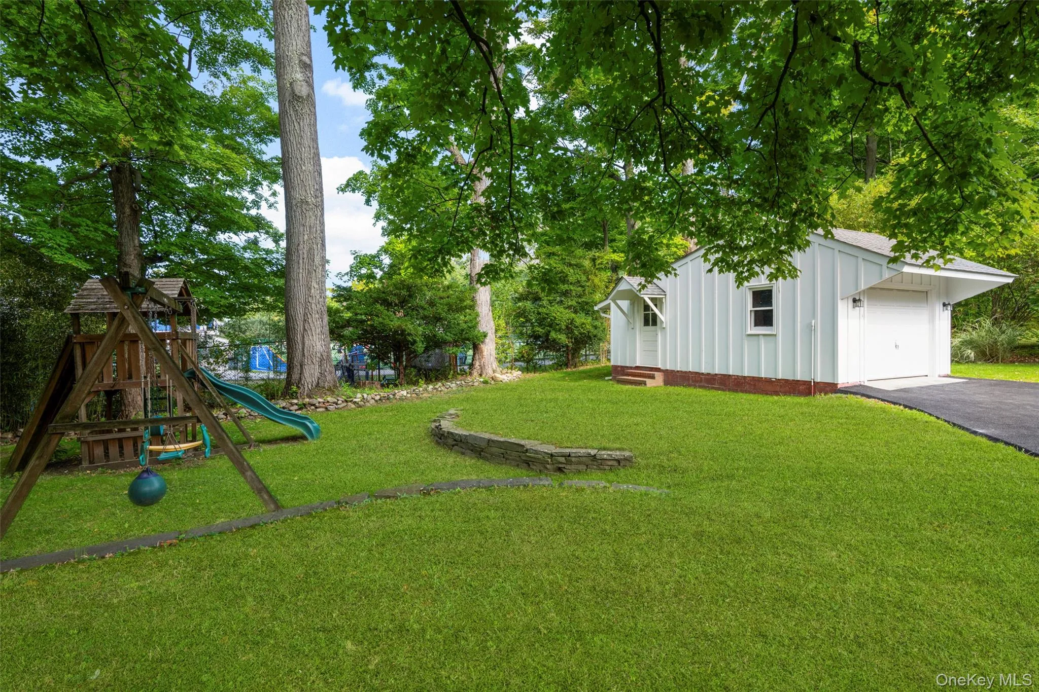 Back yard, playground and garage Back yard, playground and garage