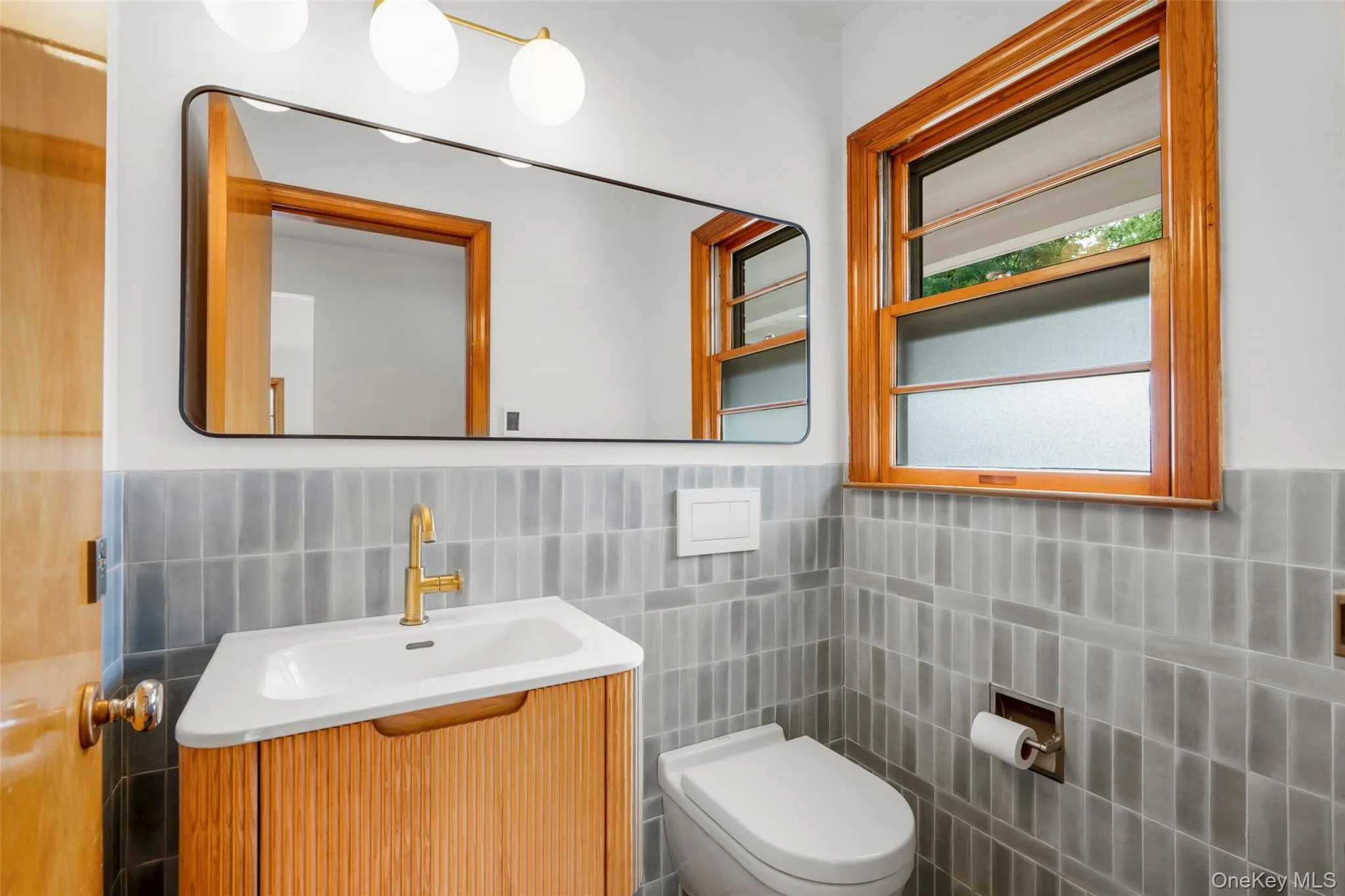 Half bath with elegant glazed tile Half bath with elegant glazed tile