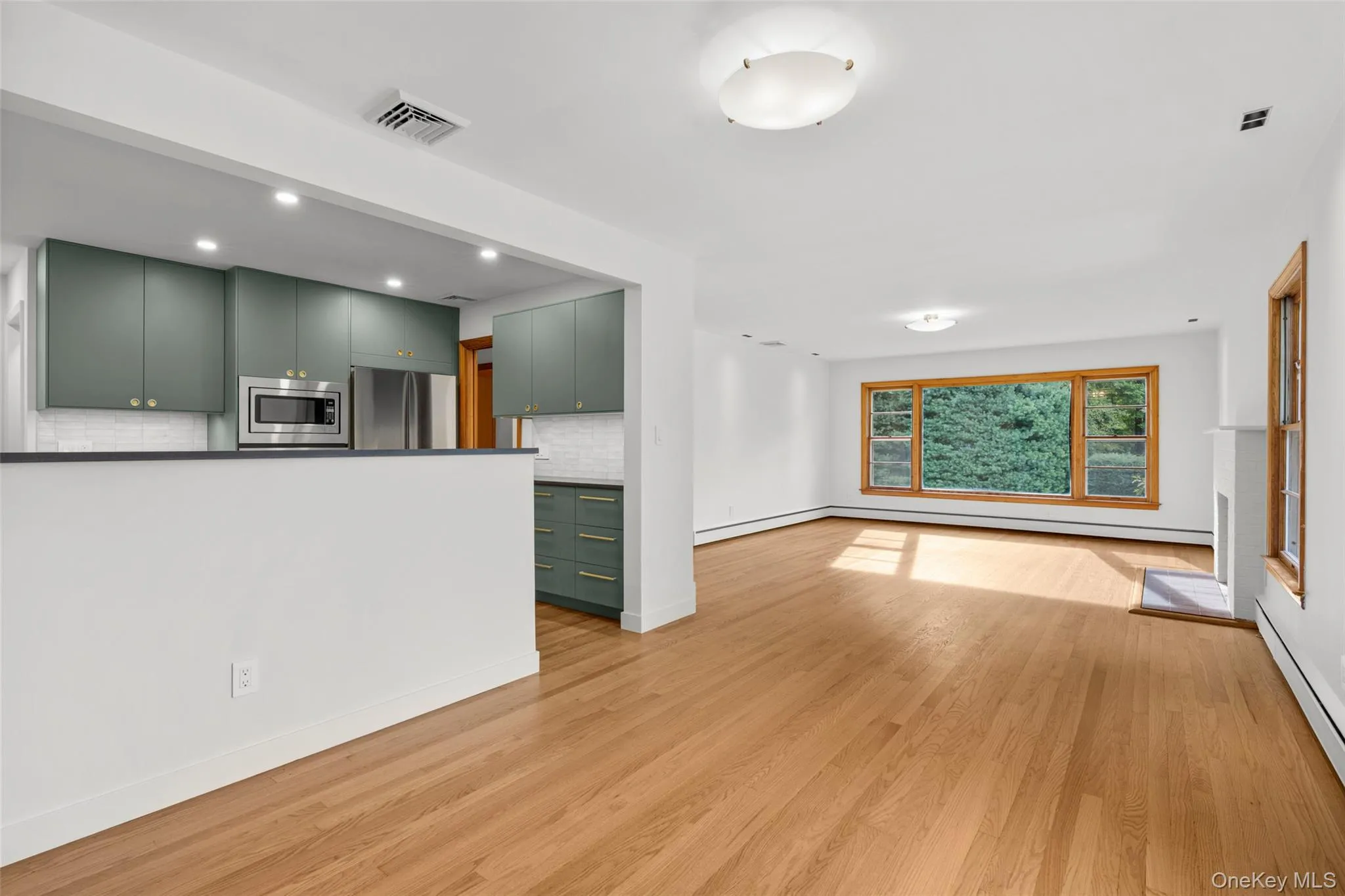 Dining area open to the kitchen and living room Dining area open to the kitchen and living room