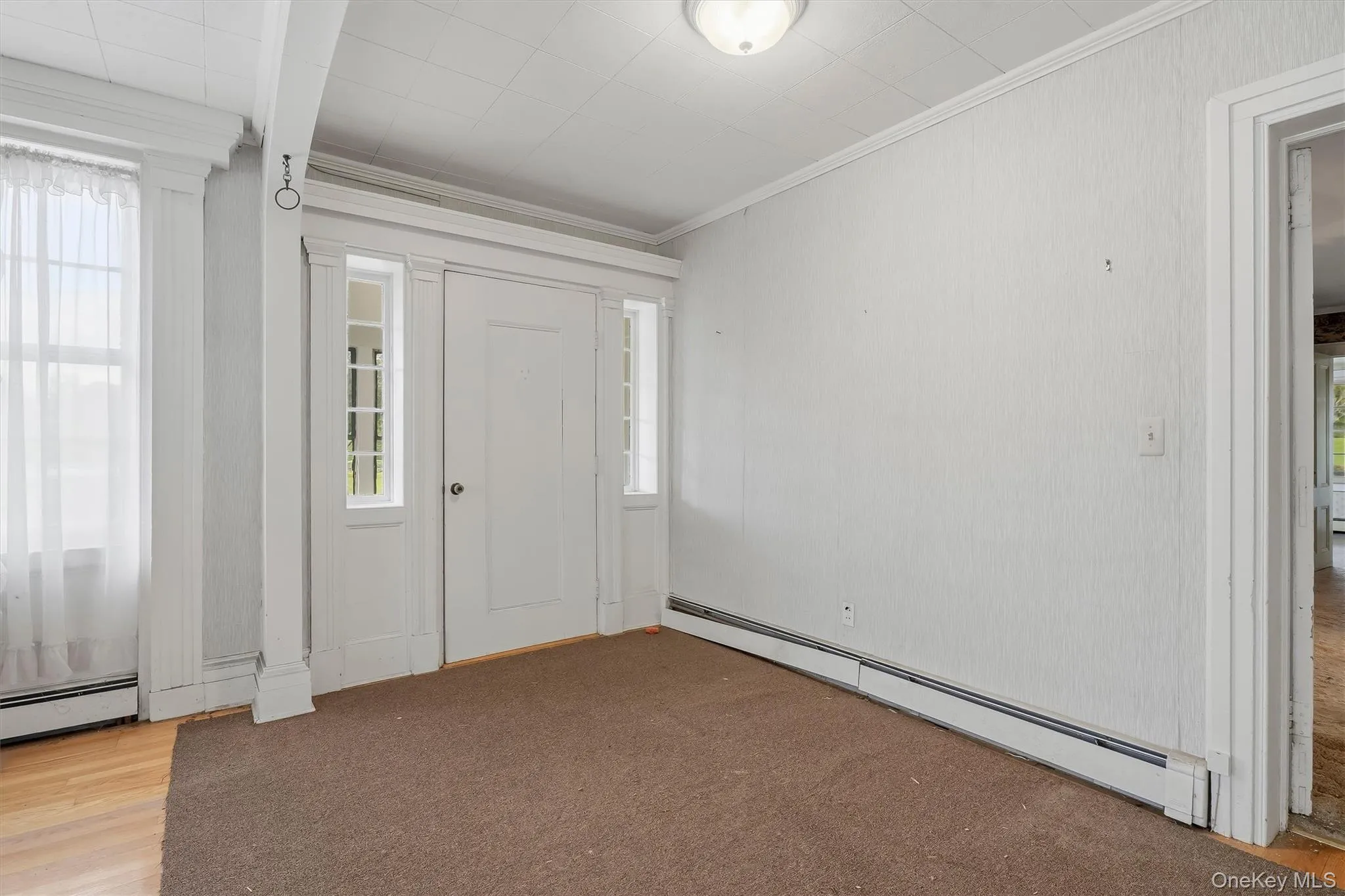 Parlor Rm/Den - with access to the screened in porch Parlor Rm/Den - with access to the screened in porch