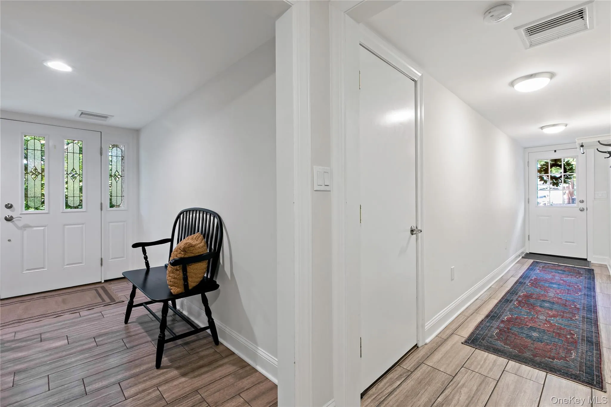 View of front and side entrance with foyer and hall View of front and side entrance with foyer and hall