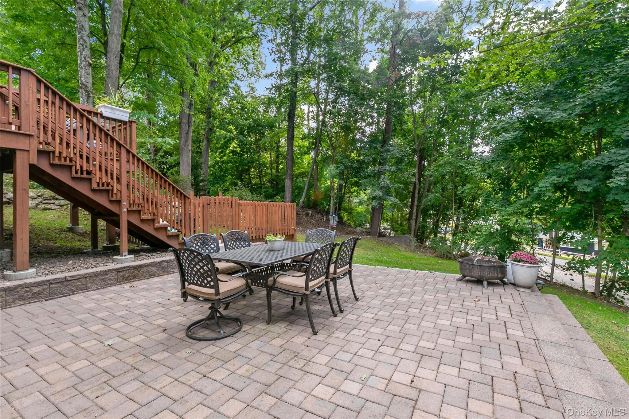 Stone Patio with stairs to Deck Stone Patio with stairs to Deck