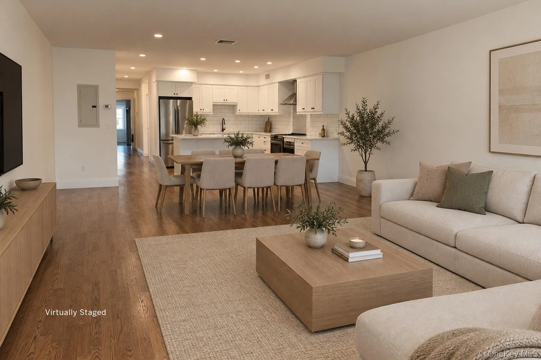 VIRTUALLY STAGED Great room from front windows towards kitchen VIRTUALLY STAGED Great room from front windows towards kitchen