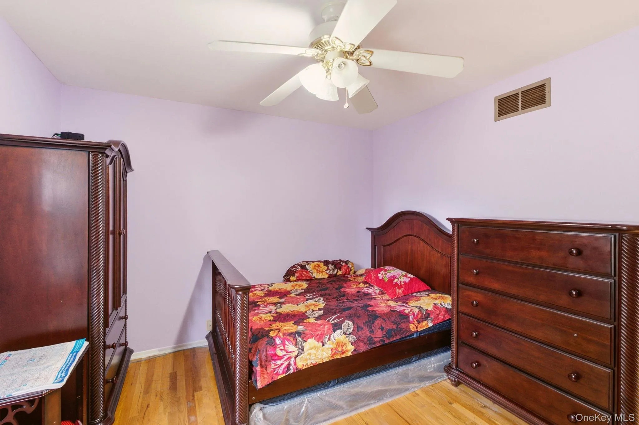 Wood-finish flooring with light-toned walls Wood-finish flooring with light-toned walls
