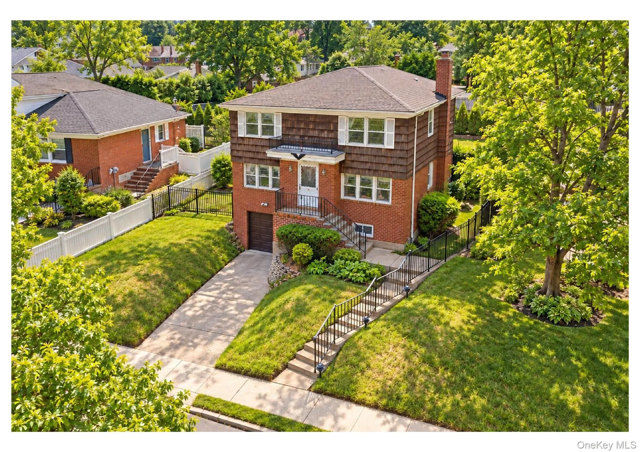 Brick and shingle exterior with a gabled roof Brick and shingle exterior with a gabled roof