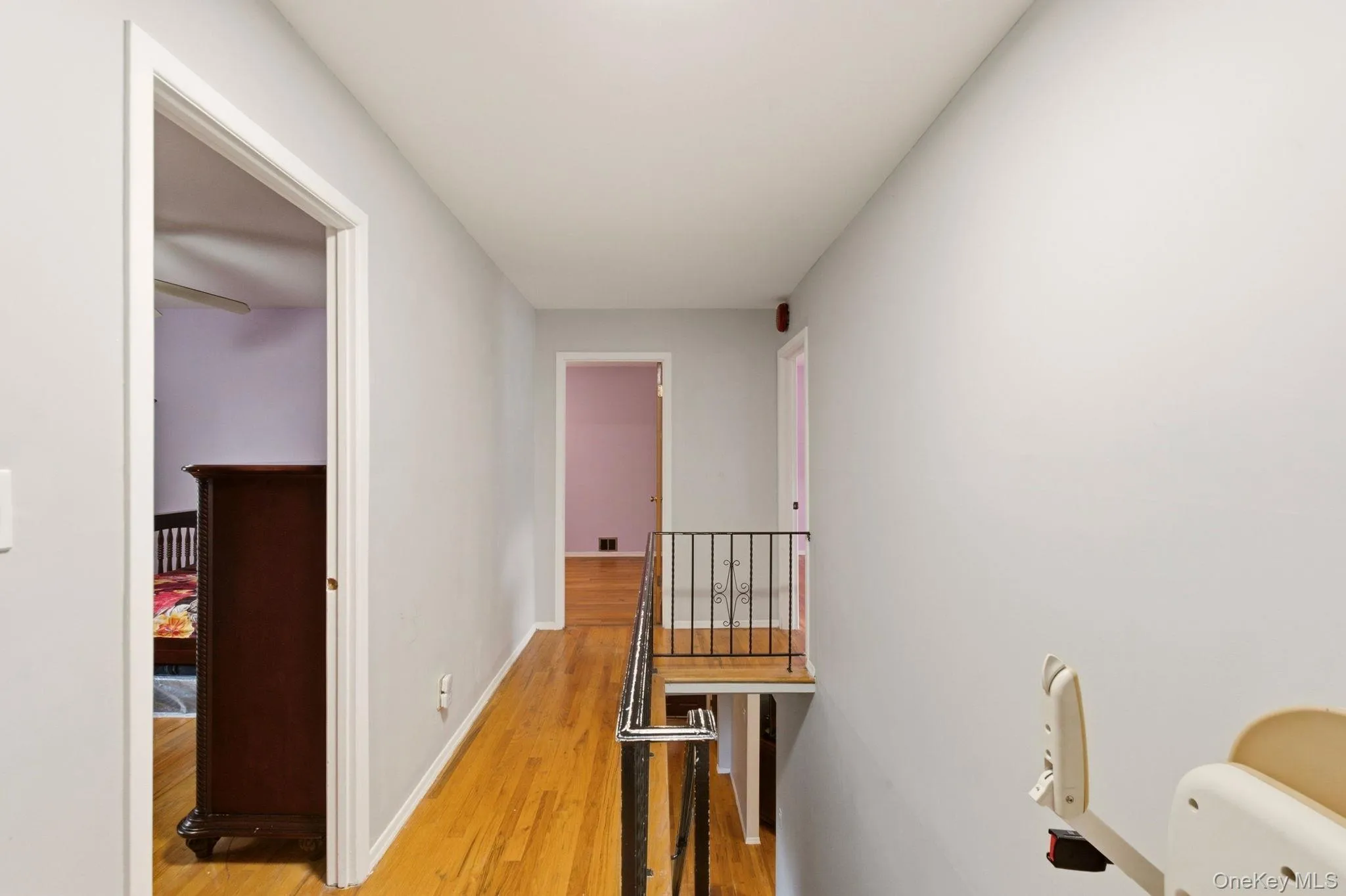 Hardwood flooring throughout the hallway Hardwood flooring throughout the hallway