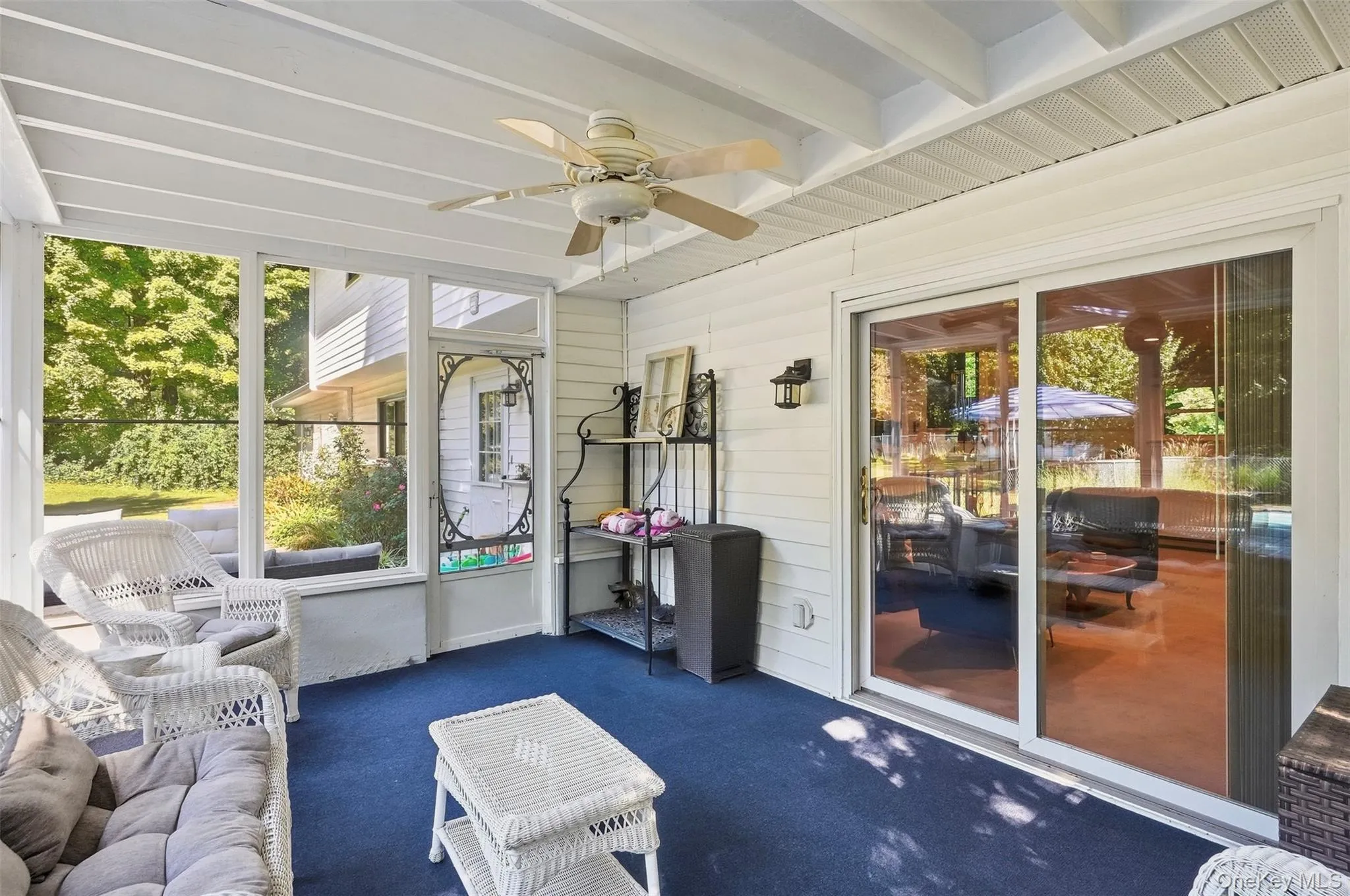 Sunroom with access to den and pool Sunroom with access to den and pool