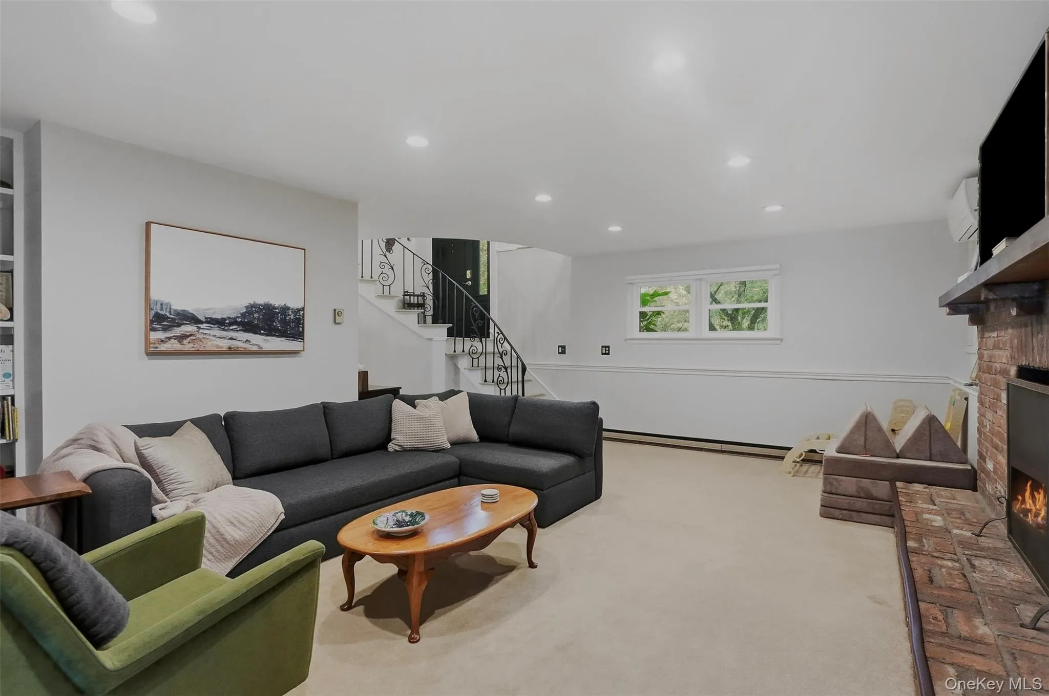 Den with access to laundry, sun room and pool Den with access to laundry, sun room and pool